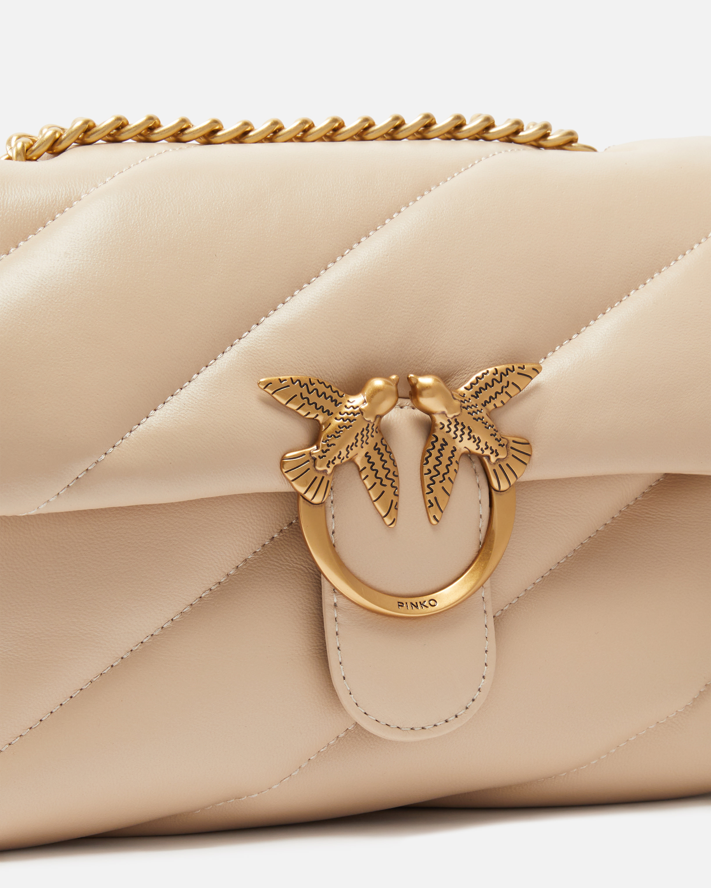 Pinko Quilted Shoulder Bag With Flap Closure And Circular Embellishment In Gold