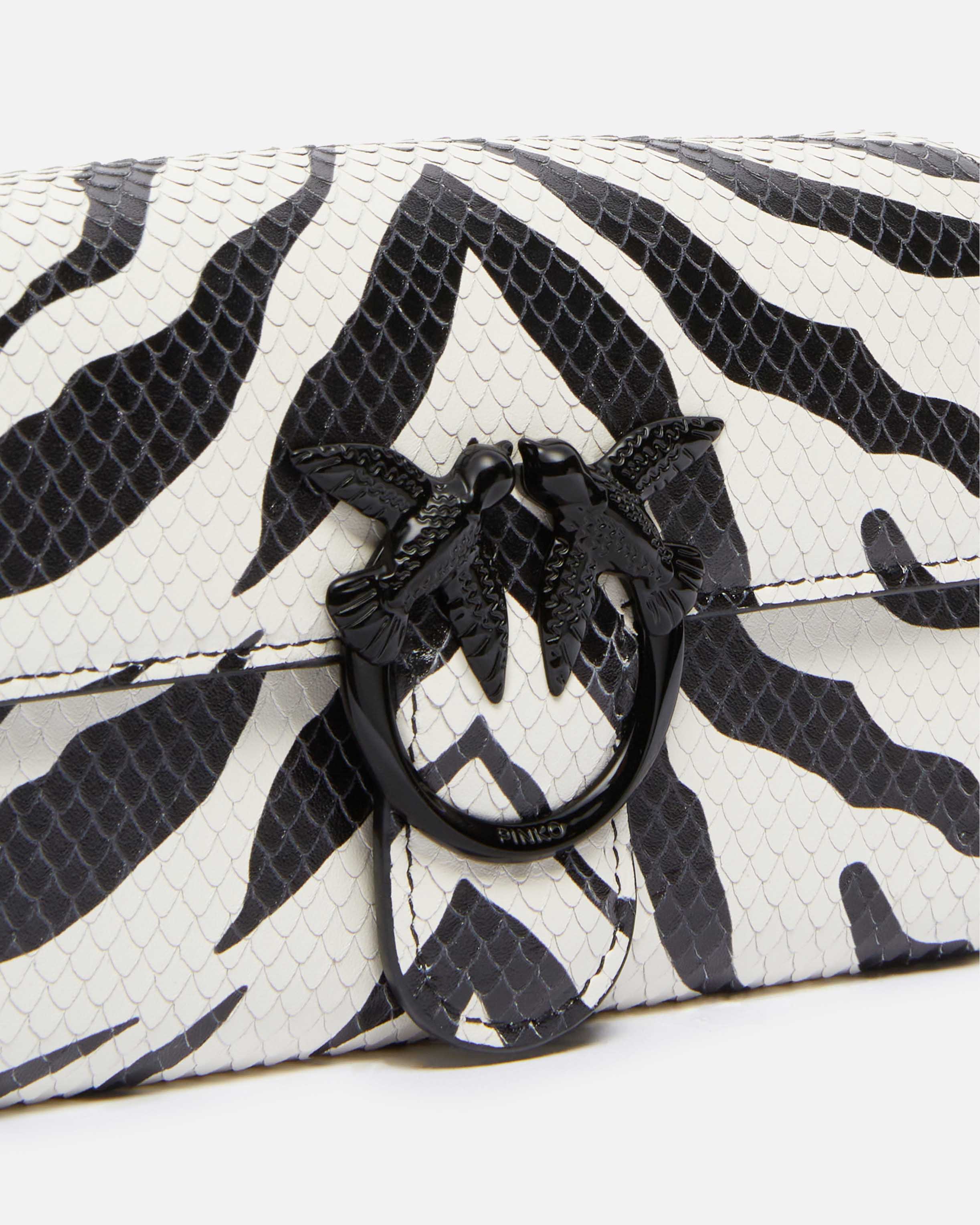 Zebra-patterned wallet with shoulder strap