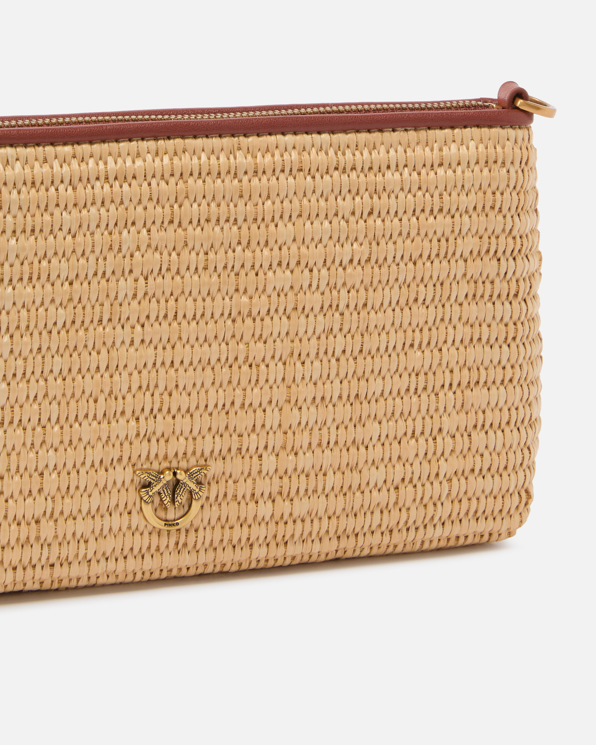 Small flat bag in crocheted raffia with removable shoulder