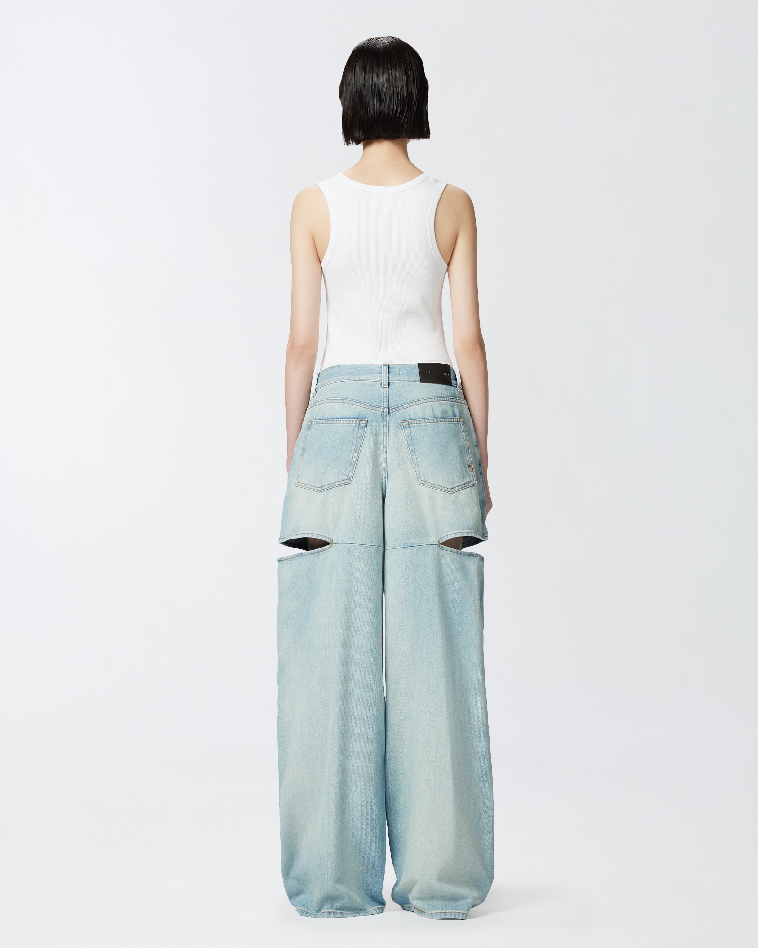 Wide-leg jeans with light wash and cut-outs PINKO → Shop Online