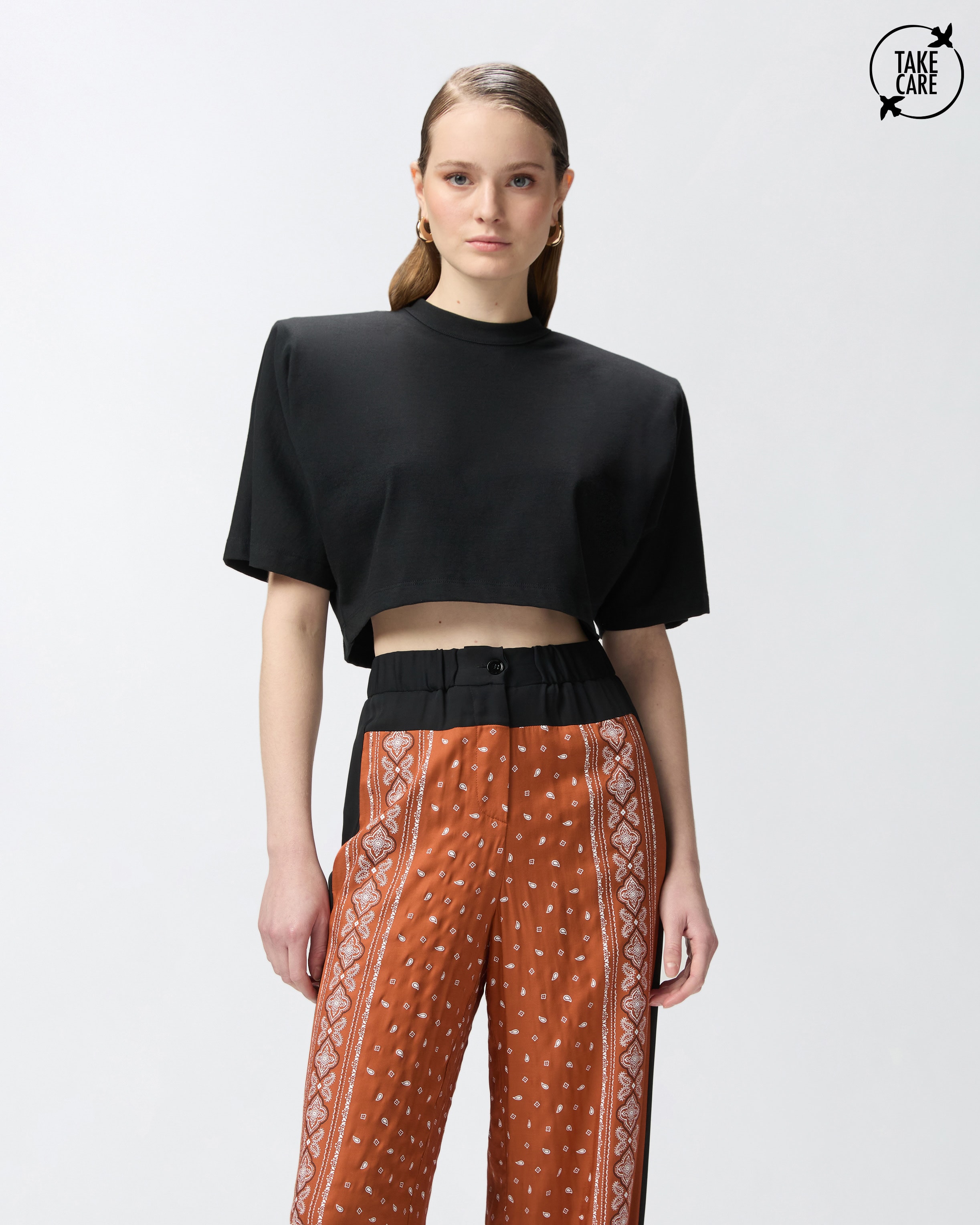 Short-sleeved crop top with padded shoulders PINKO → Shop Online