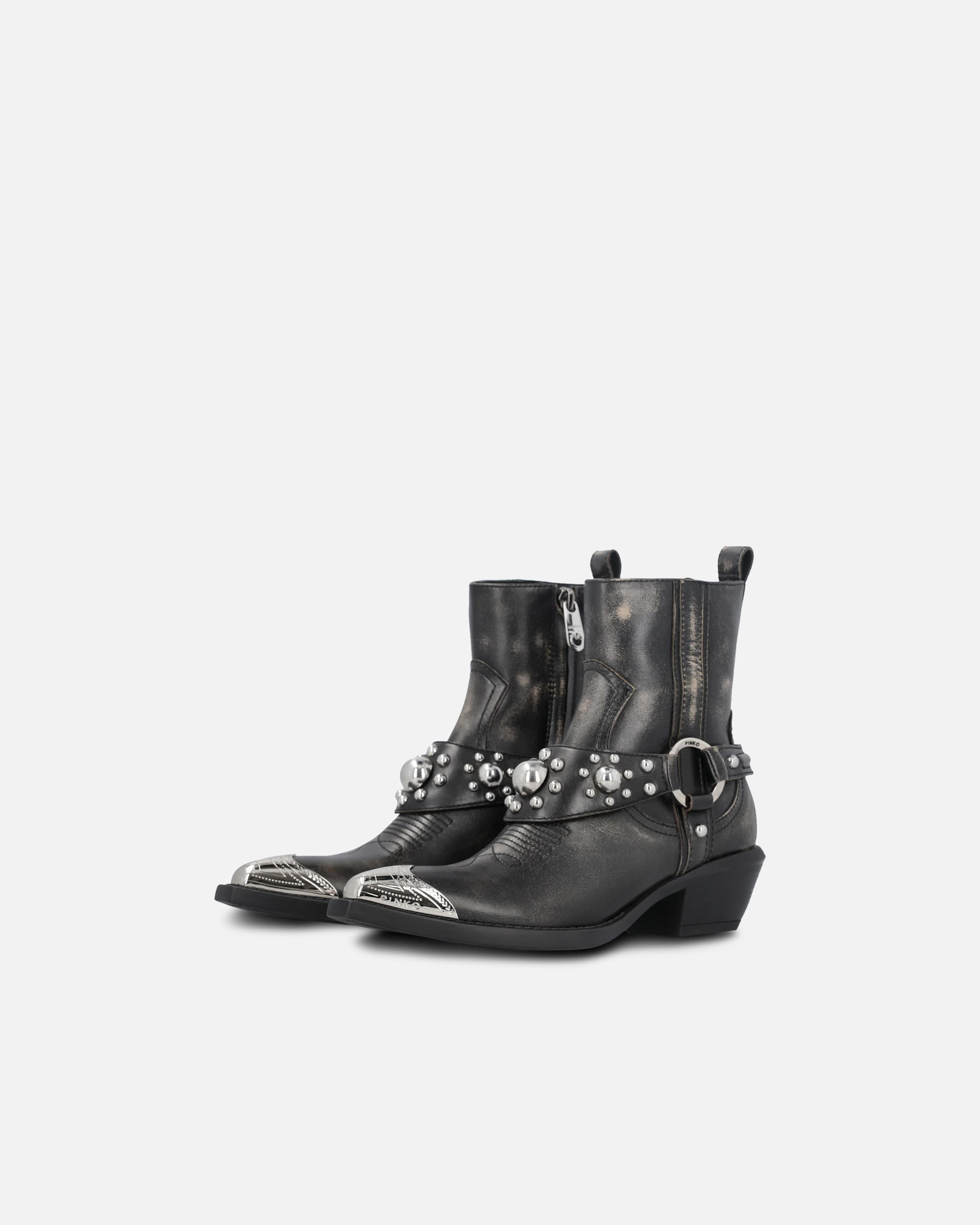 Ankle cowboy boots in distressed leather with a metal toe cap