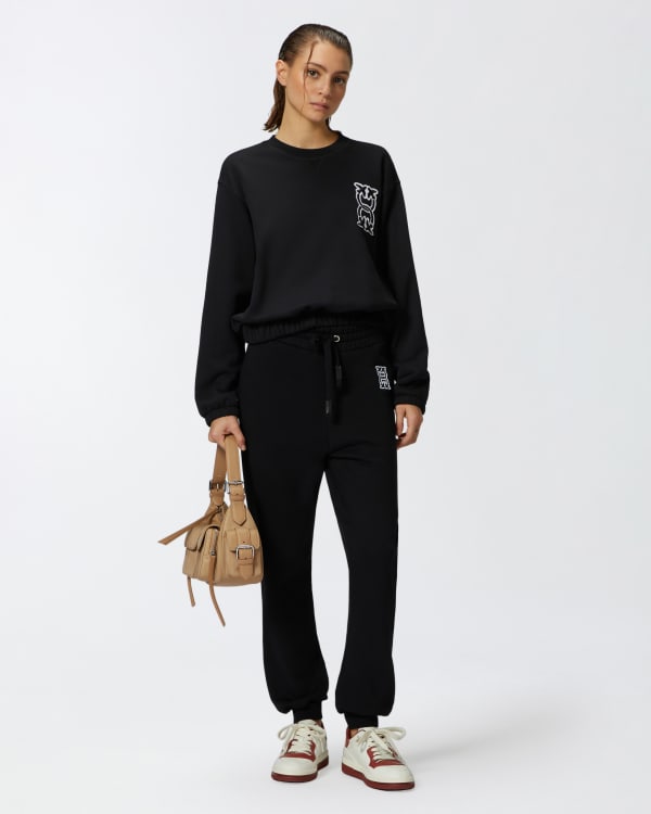 Sporty joggers with logo patch PINKO → Shop Online