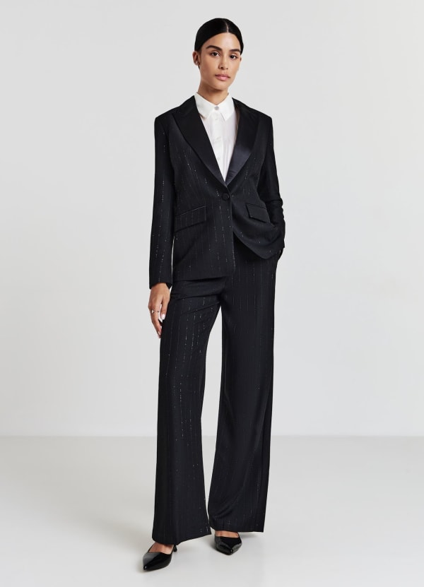 Pantaloni palazzo con paillettes