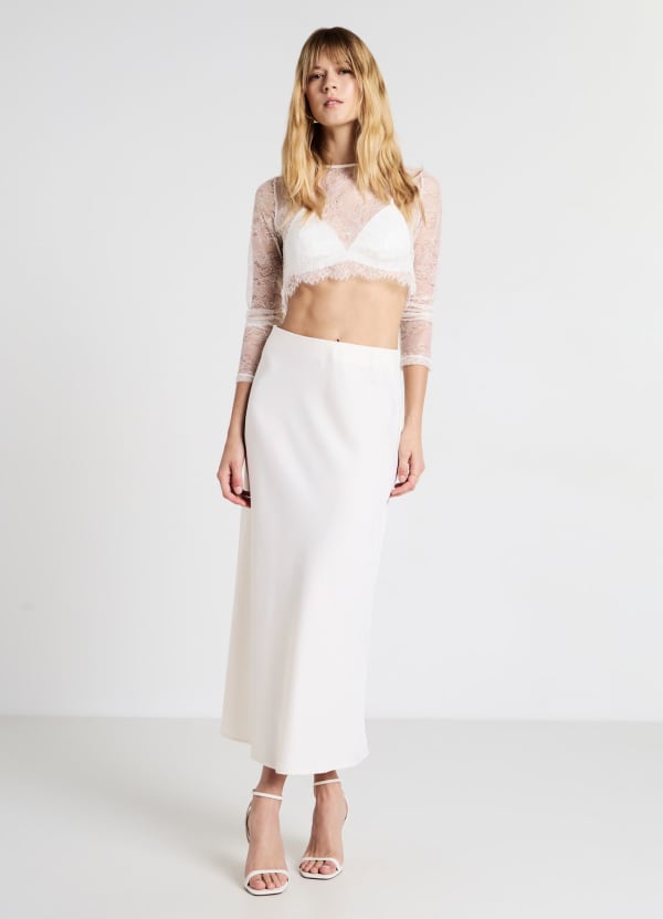 Maglia crop in pizzo con bralette