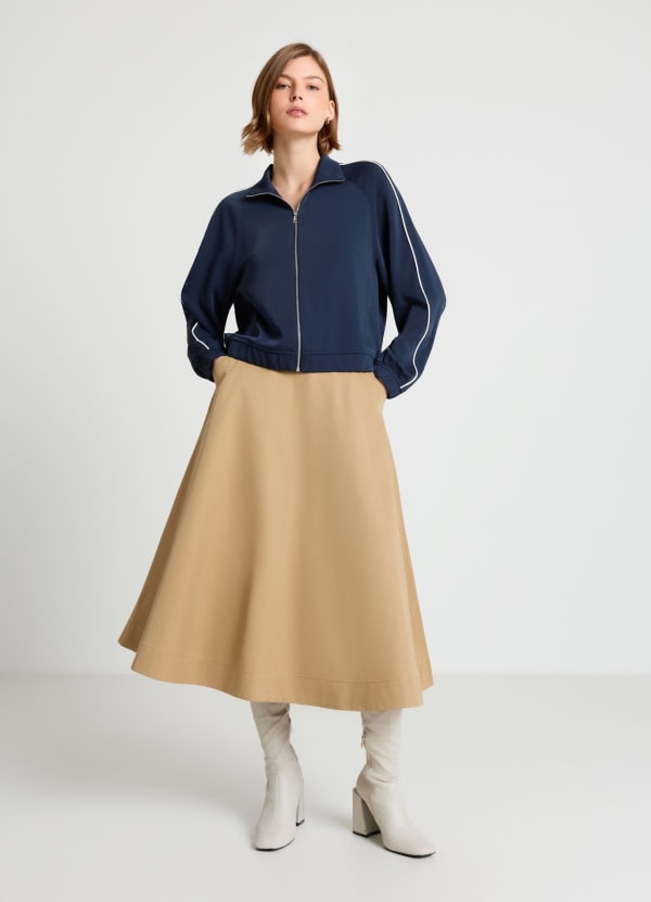 Gonna longuette svasata con tasche