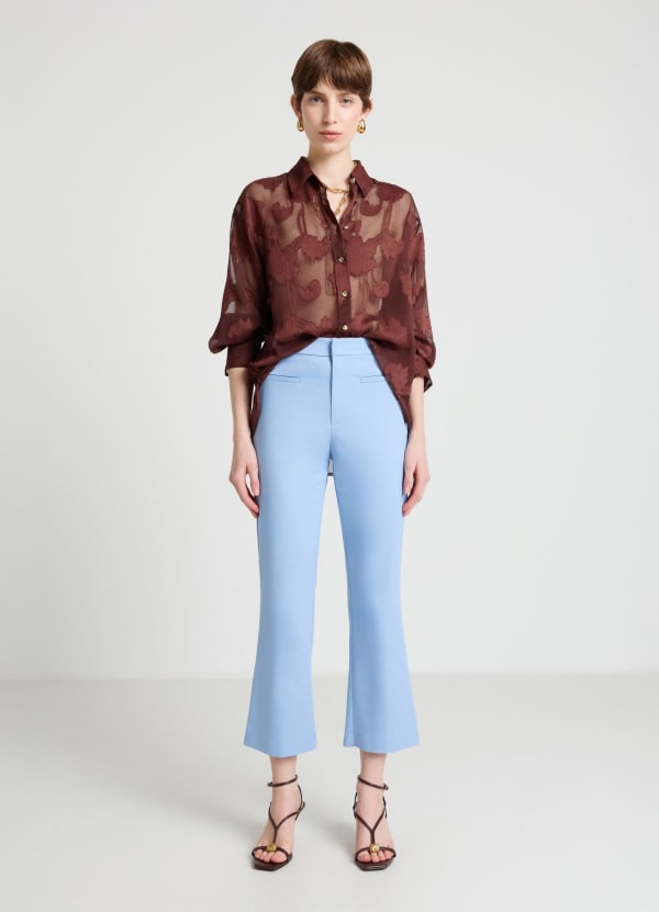 Pantaloni cropped flare tinta unita