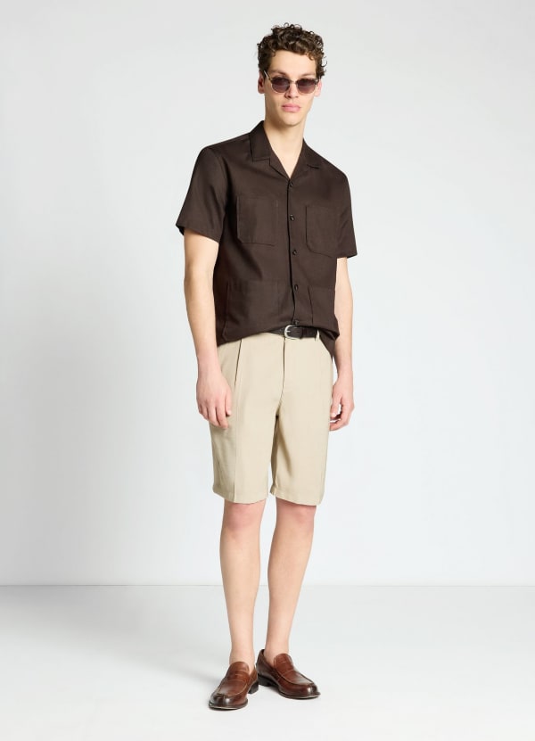 Pantaloncini bermuda con pieghe