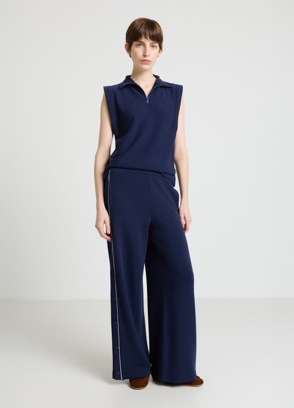 Pantaloni palazzo con bottoni laterali