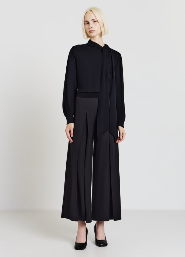 Pantaloni ampi con pieghe