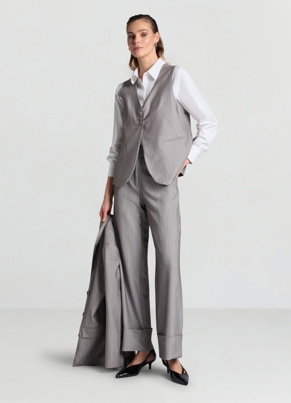 Pantaloni palazzo gessati con risvolto