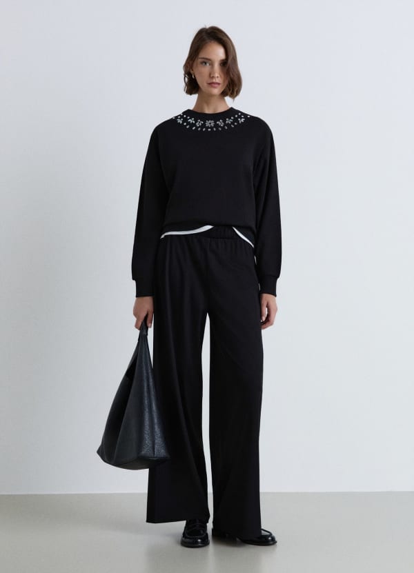 Pantaloni a gamba ampia con vita elastica