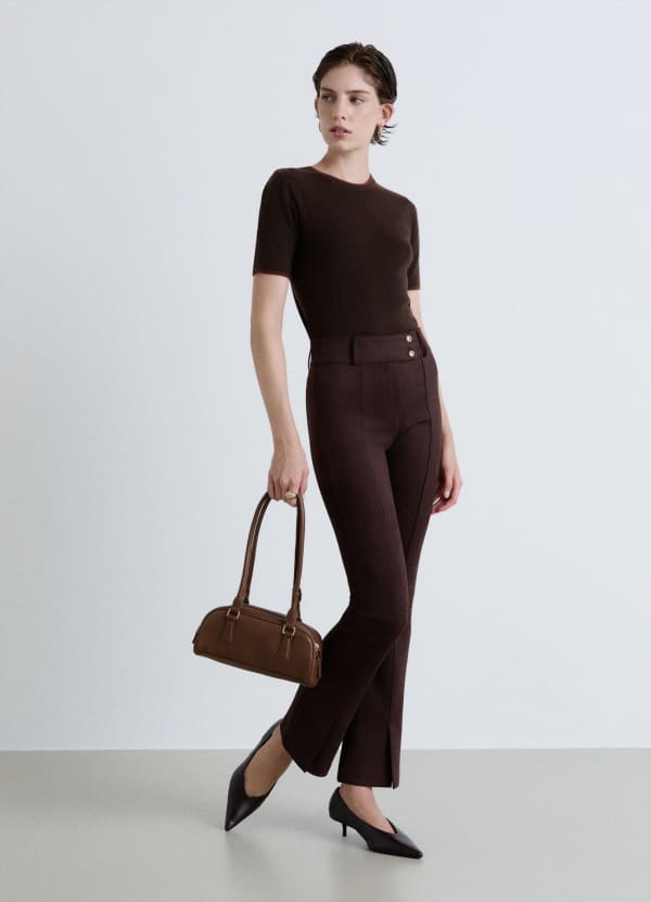 Pantaloni bootcut a vita alta con doppio bottone