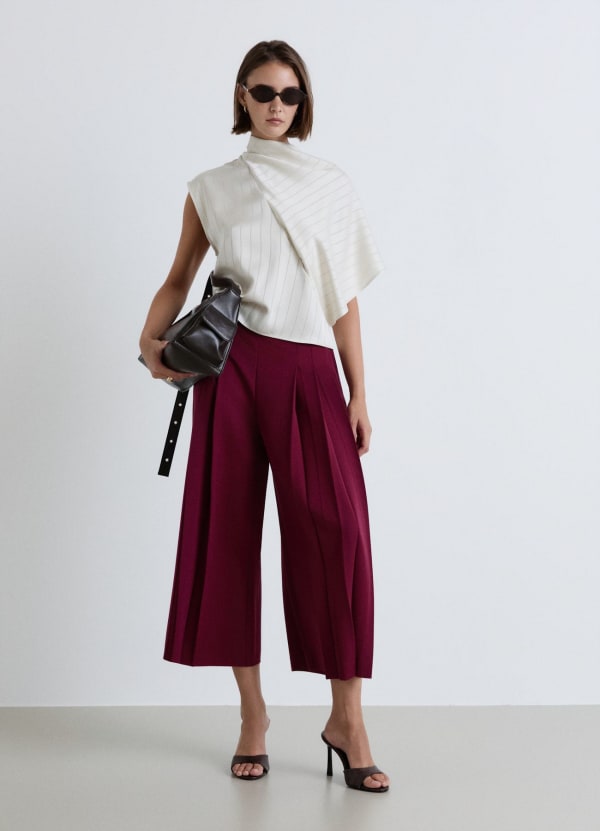 Pantaloni culotte con pieghe simmetriche