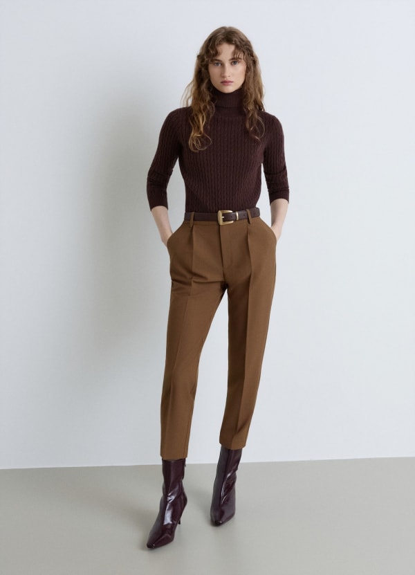 Maglione dolcevita a trecce