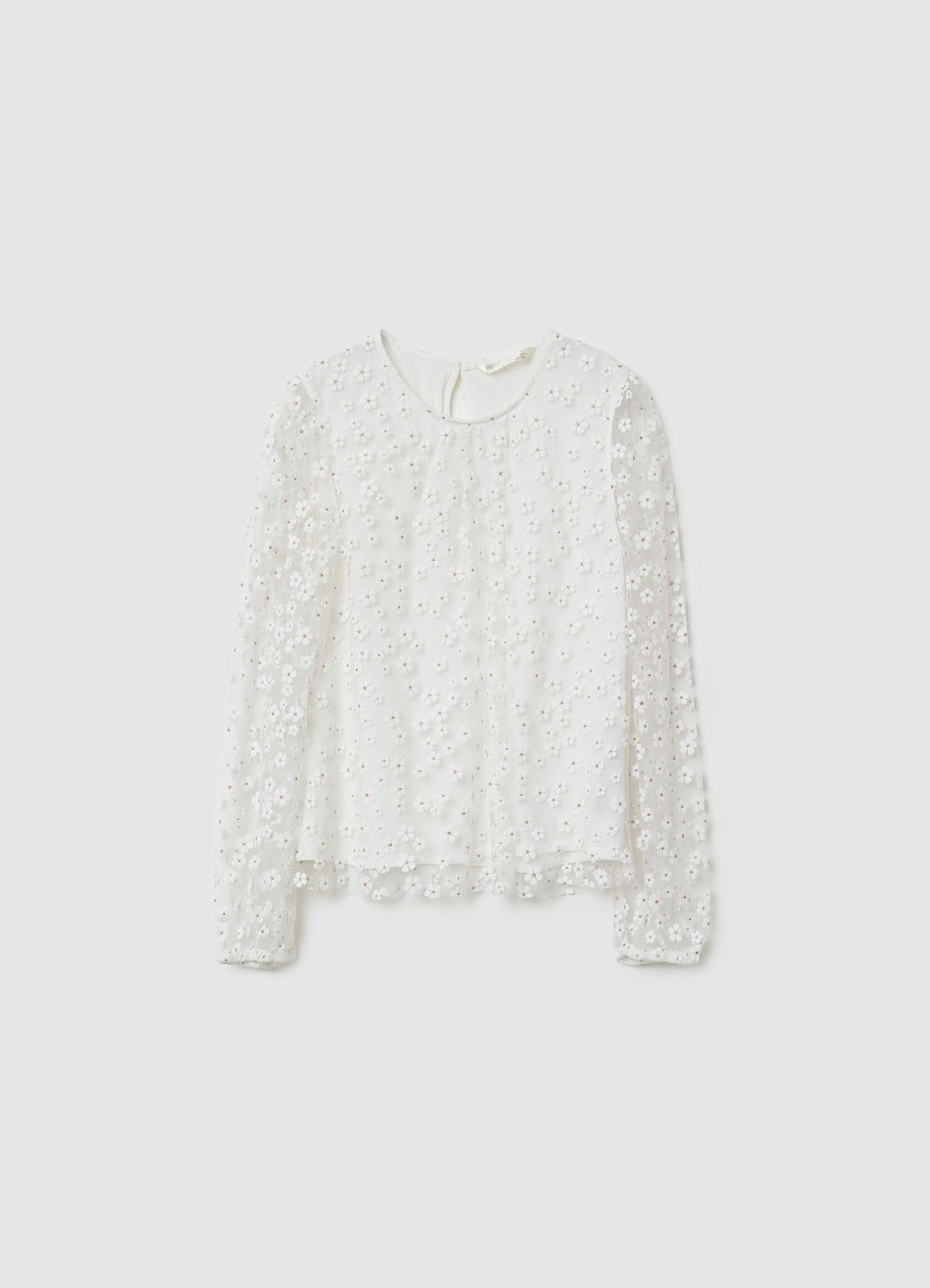 Blusa con ricami floreali e maniche lunghe