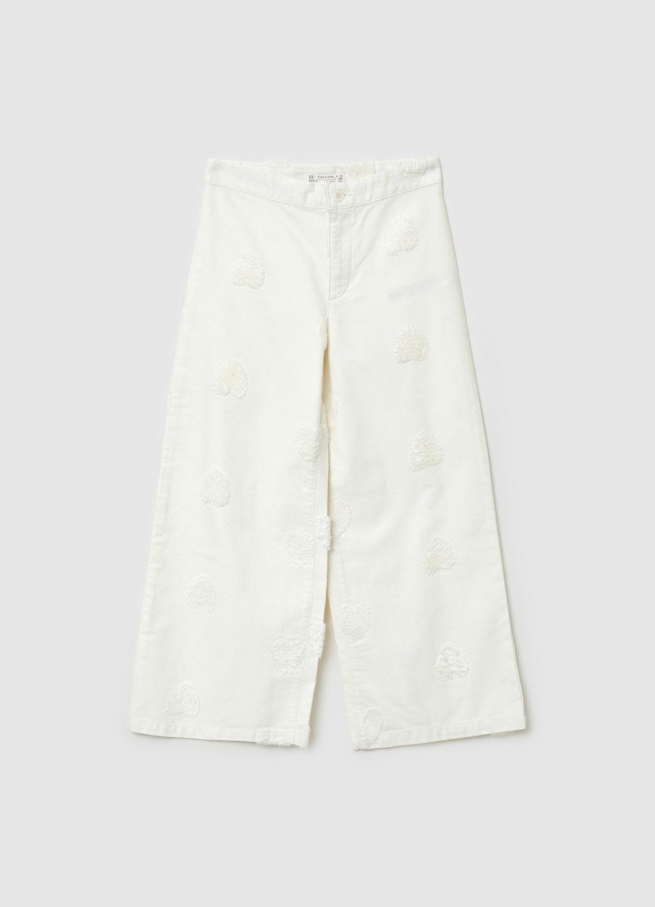 Pantaloni wide leg con cuori in rilievo