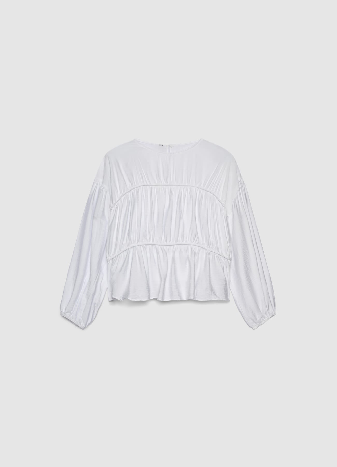 Blusa con maniche a sbuffo e balze arricciate