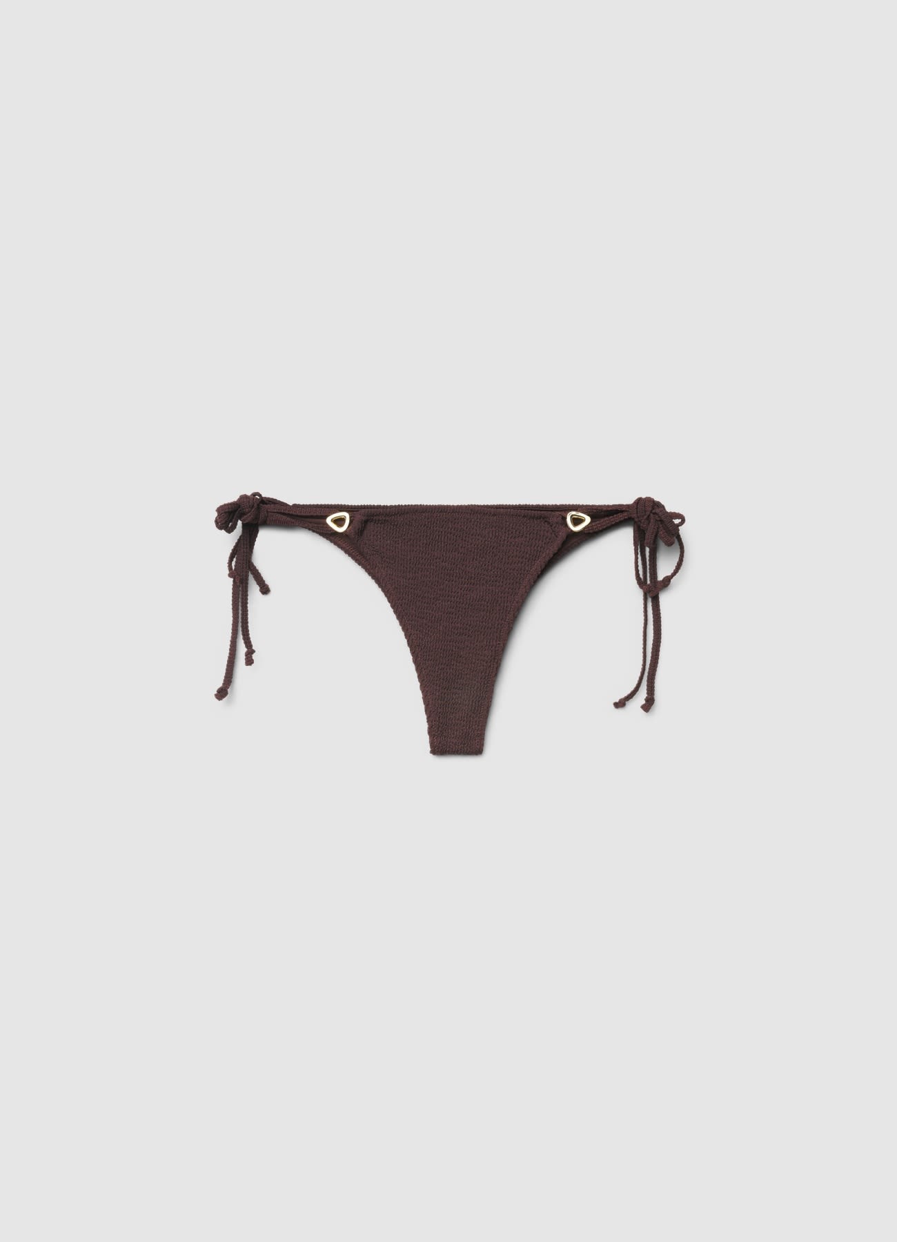 Slip bikini brasiliana goffrata con laccetti laterali