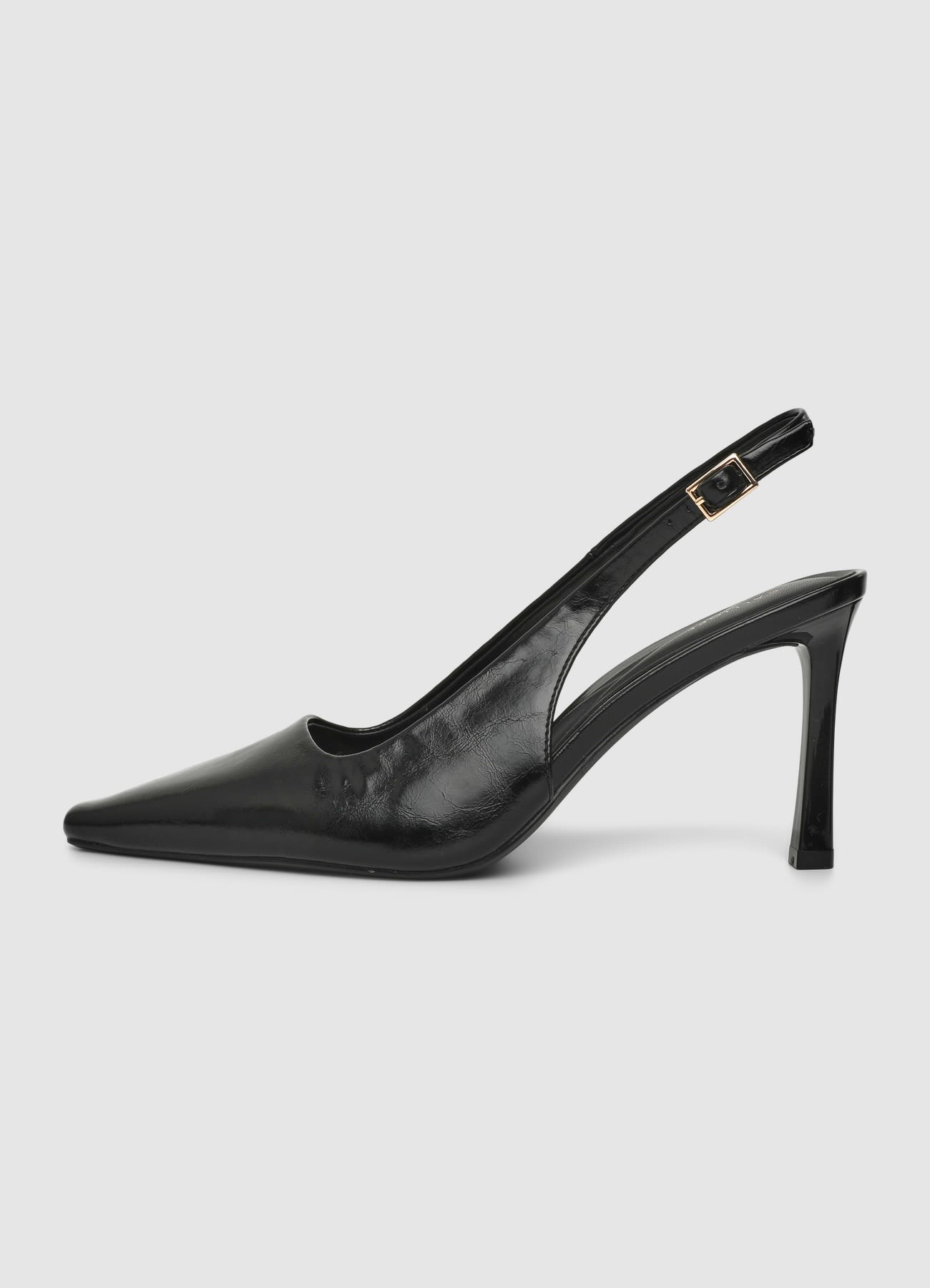 Slingback con tacco alto e punta affusolata