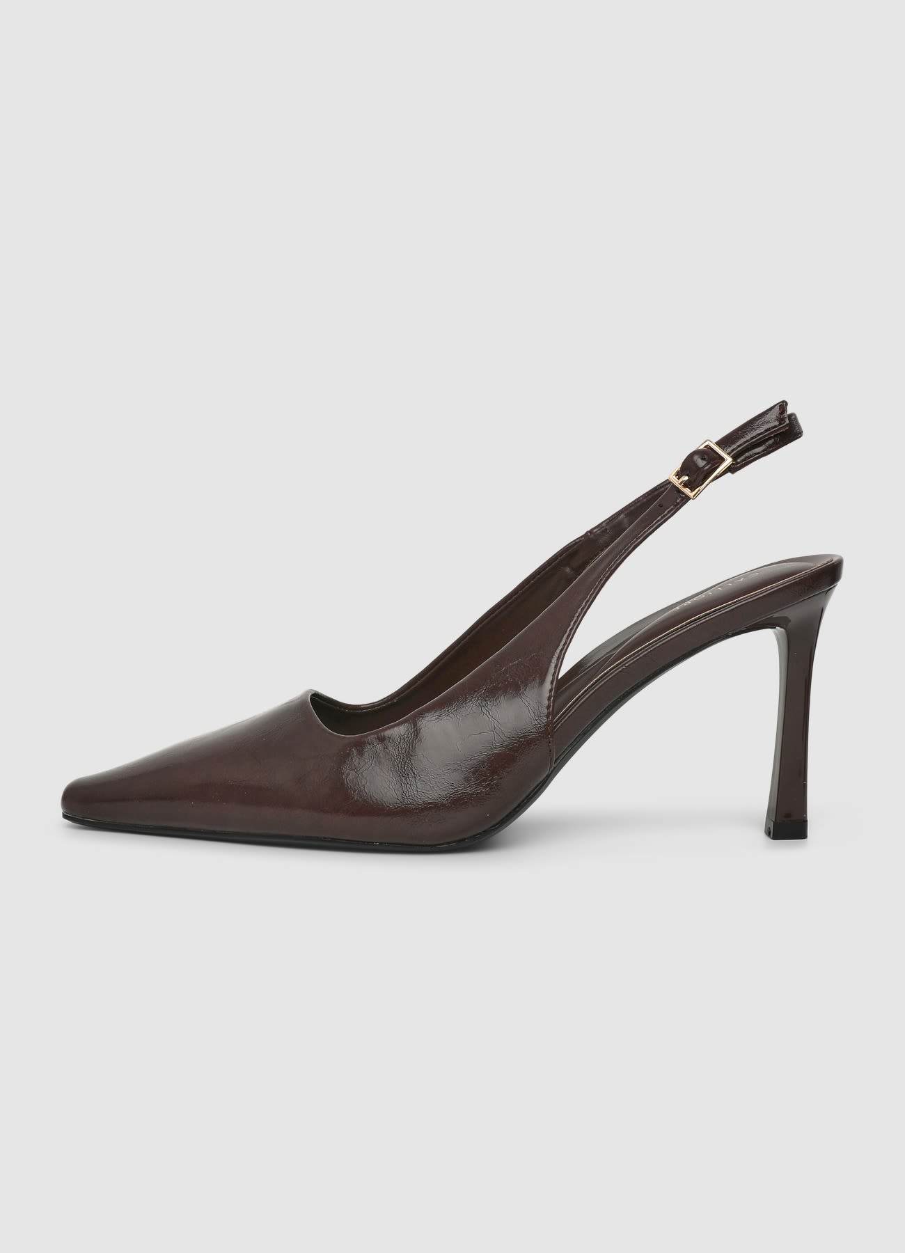 Slingback con tacco alto e punta affusolata