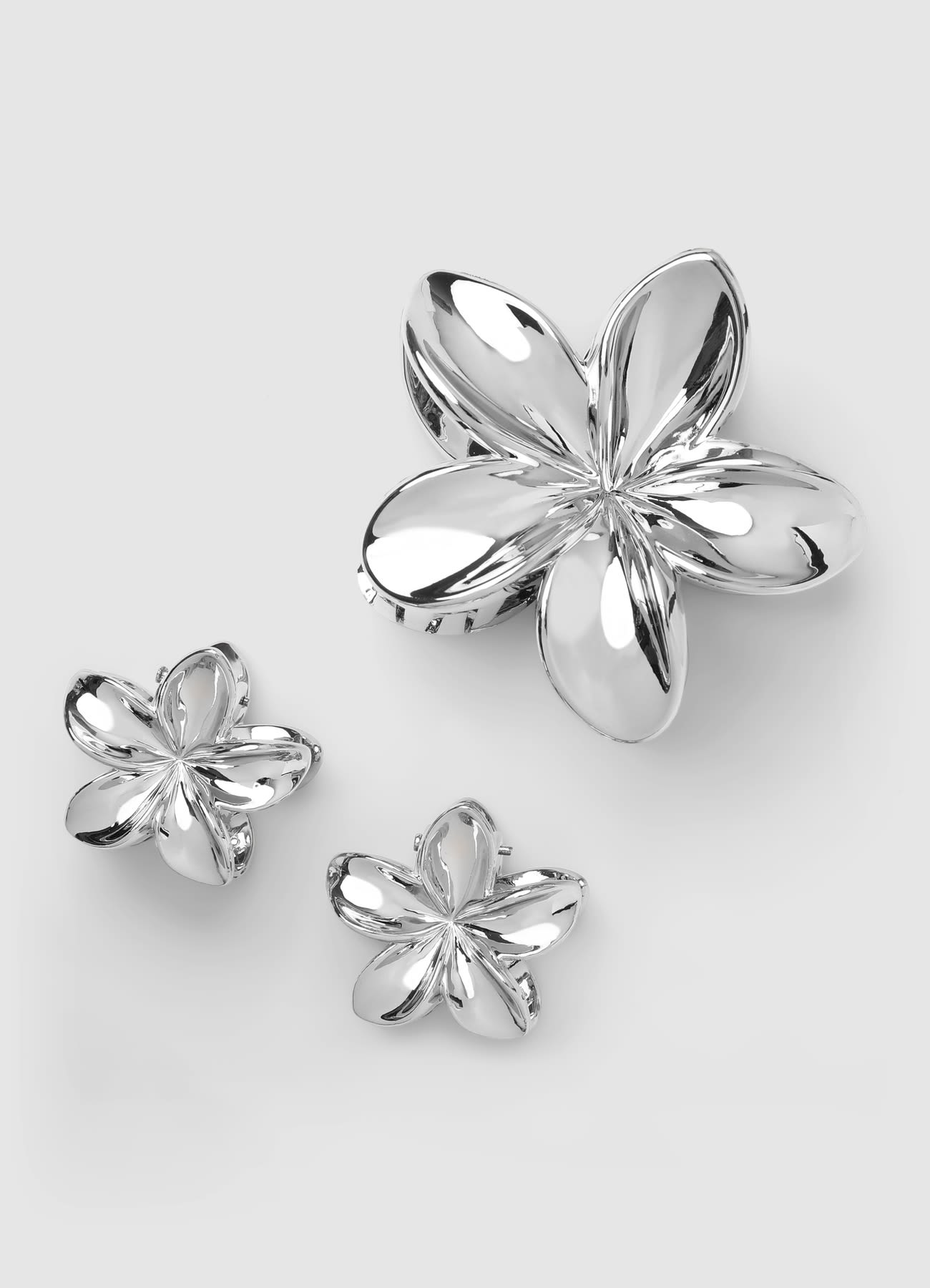 Pack 3 fermagli a fiore con effetto laminato