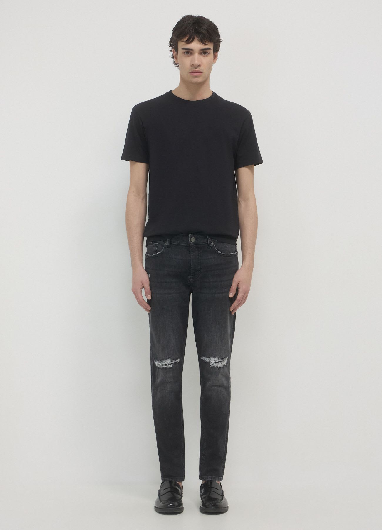 Jeans skinny con strappi