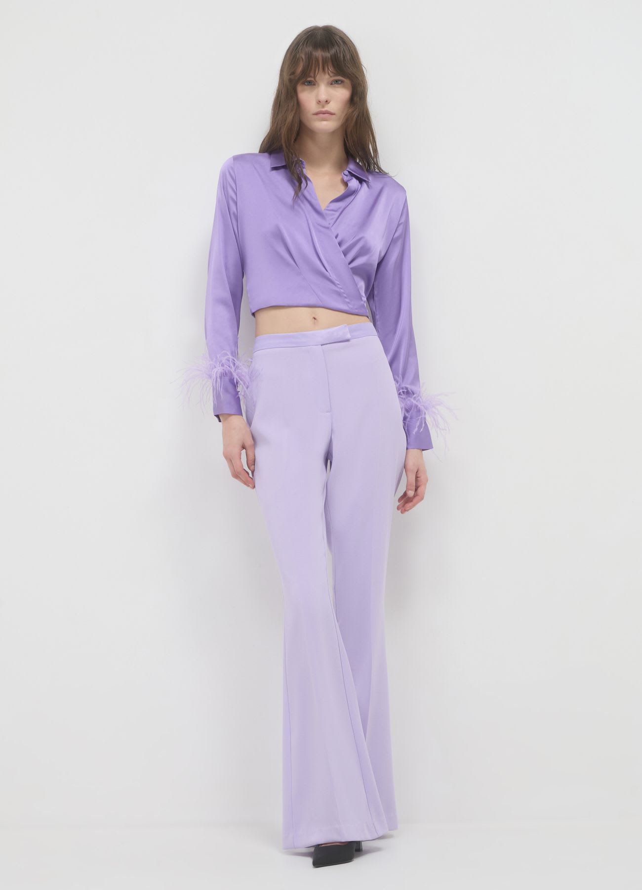Pantaloni a zampa tessuto crepe