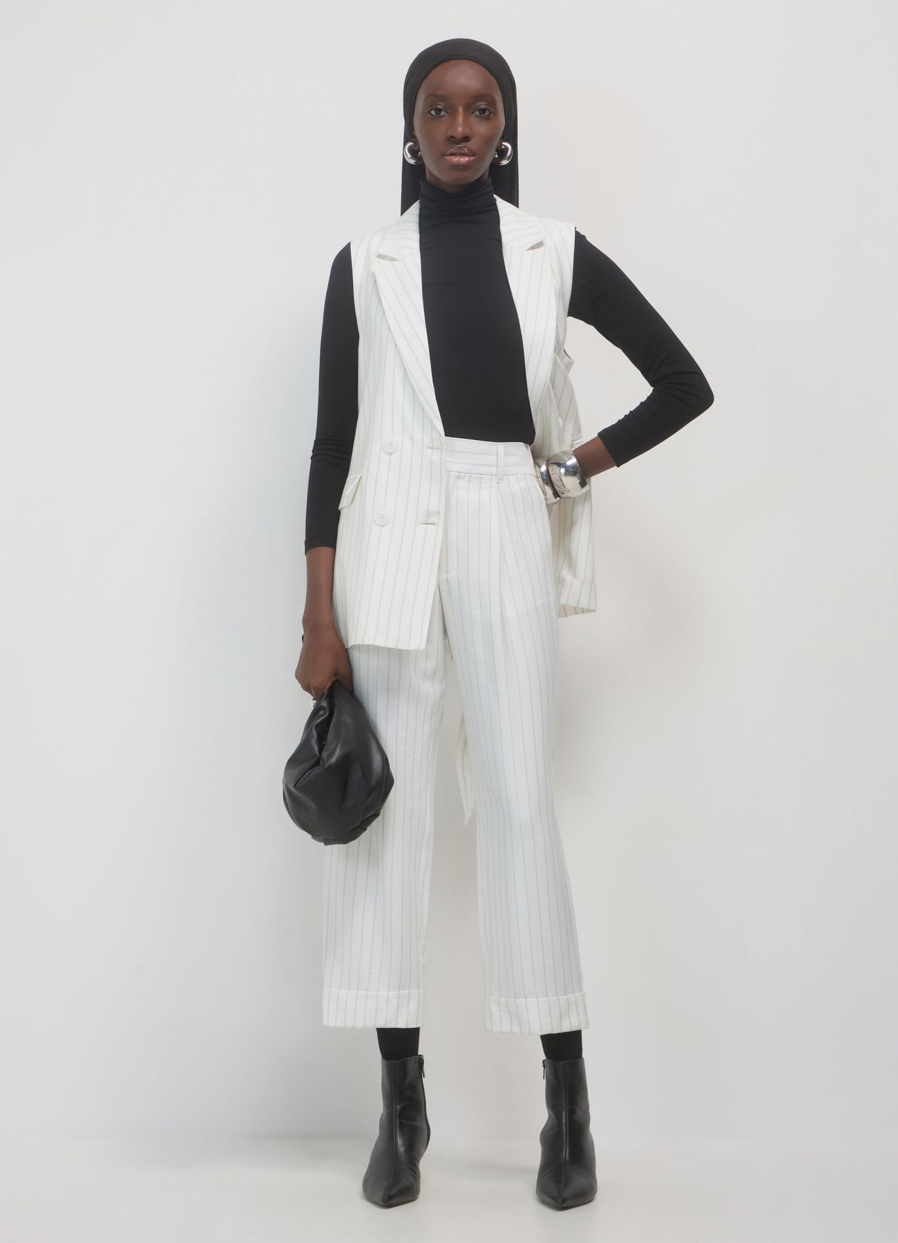 Pantalone classico a righe con risvolto