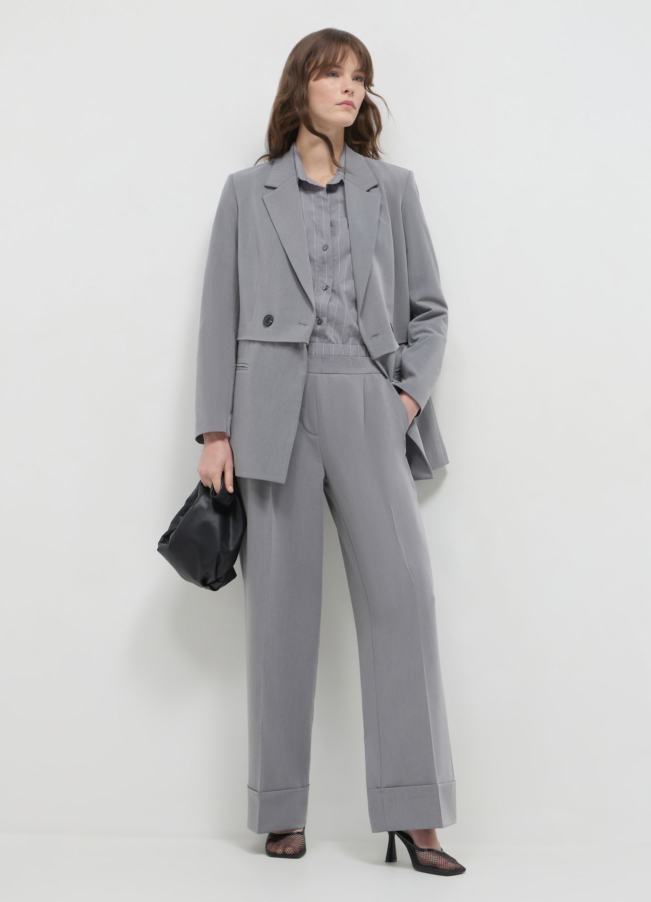 Pantaloni straight con risvolto