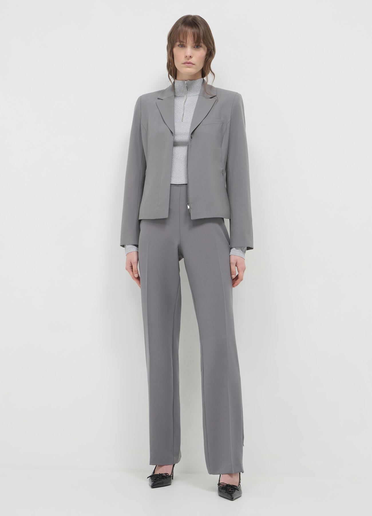 Pantaloni slim con merletto
