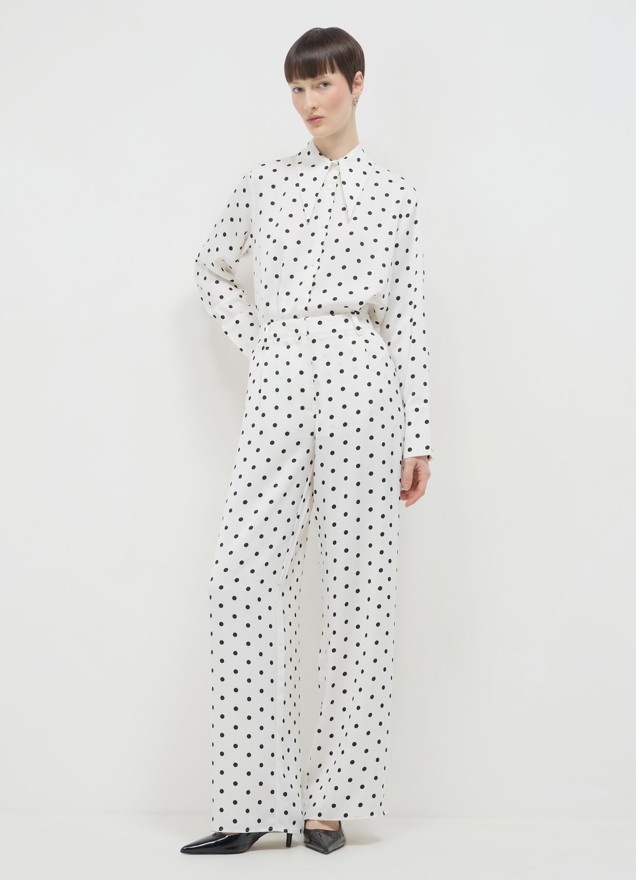 Pantalone palazzo simil satin a pois