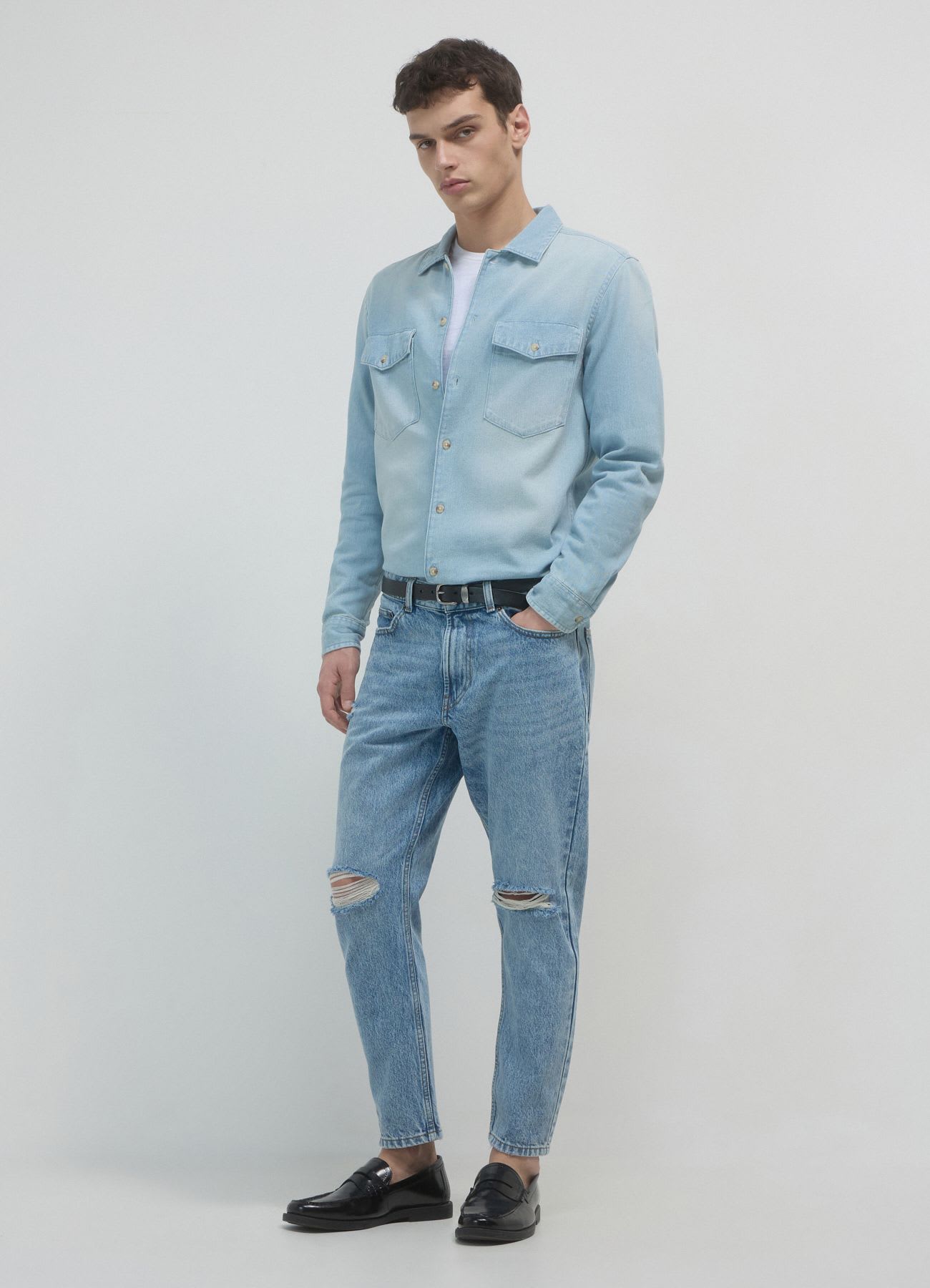 Jeans cropped con strappi