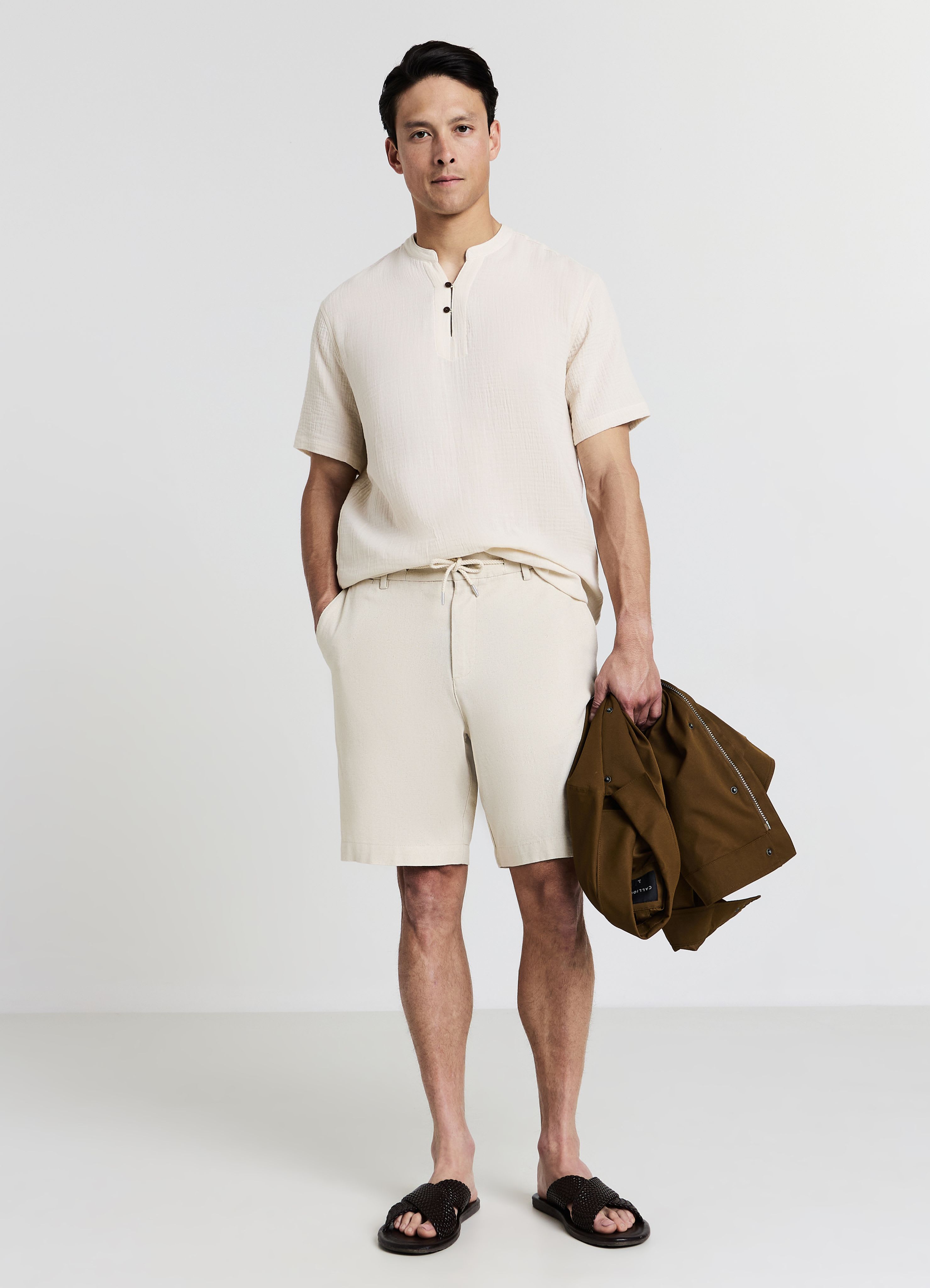 Camicia bottoncini tessuto goffrato