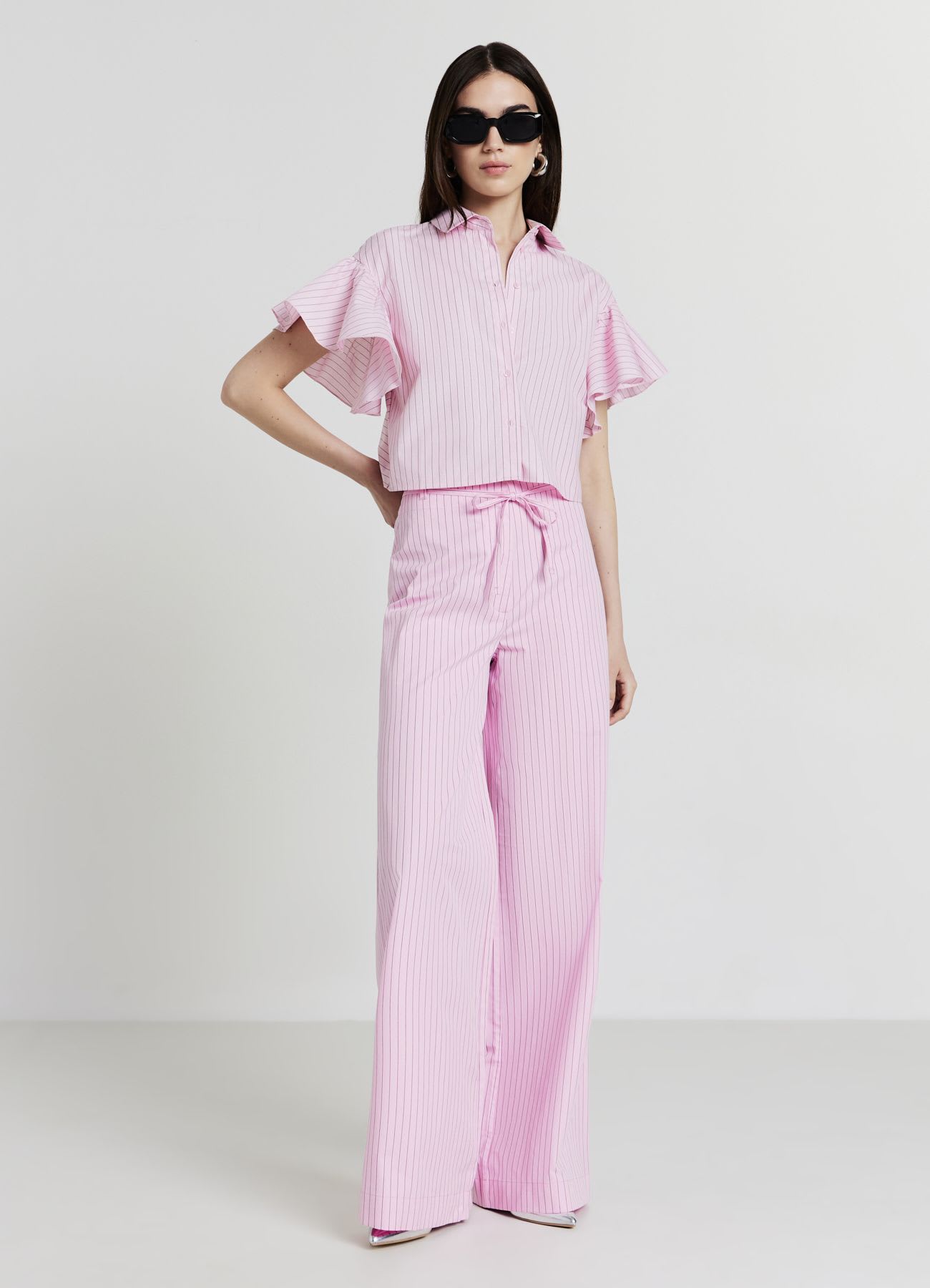Camicia a righe con oblò sul retro