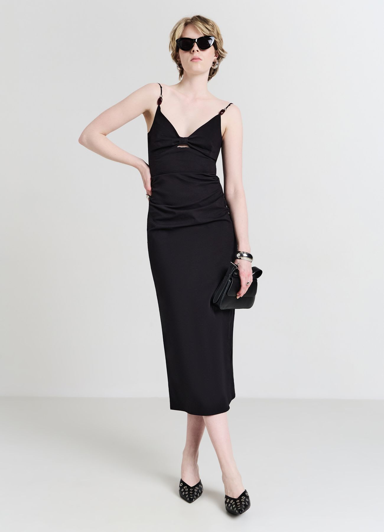 Vestito lungo cut out e perline