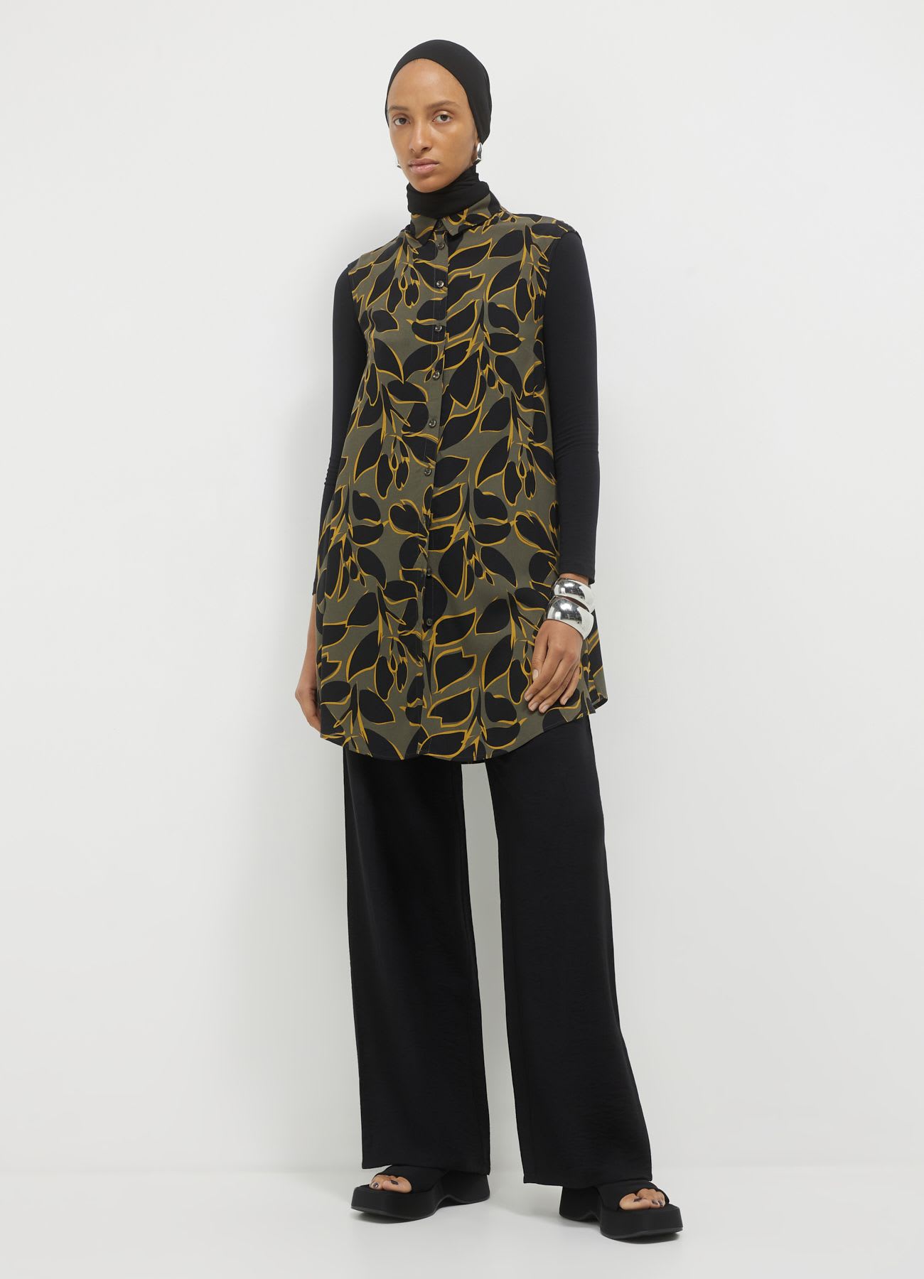 Camicia smanicata lunga a fantasia