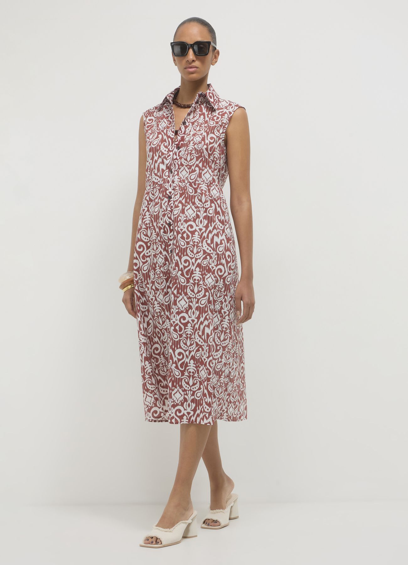 Vestito smanicato fantasia bicolor