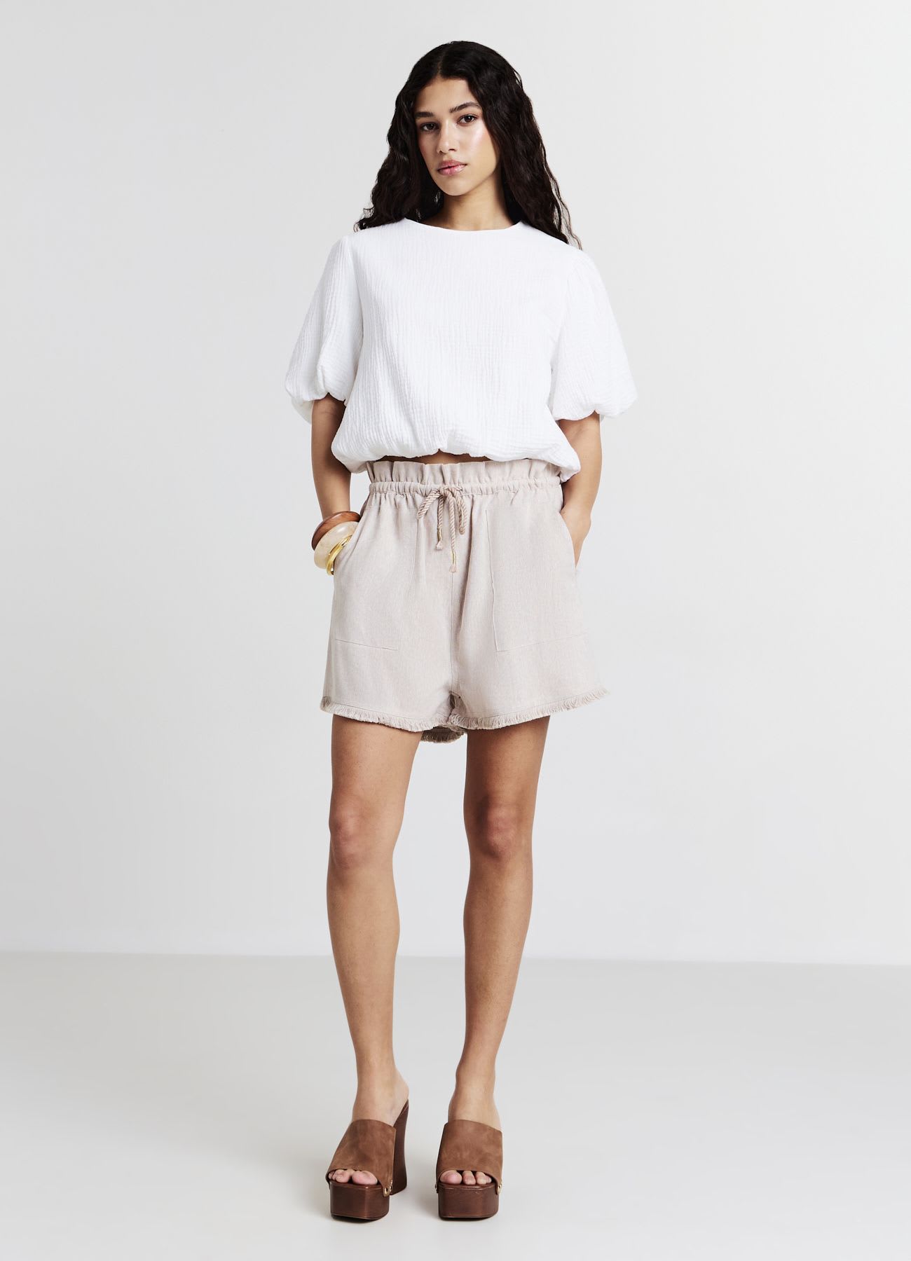 Pantaloncini misto lino frange