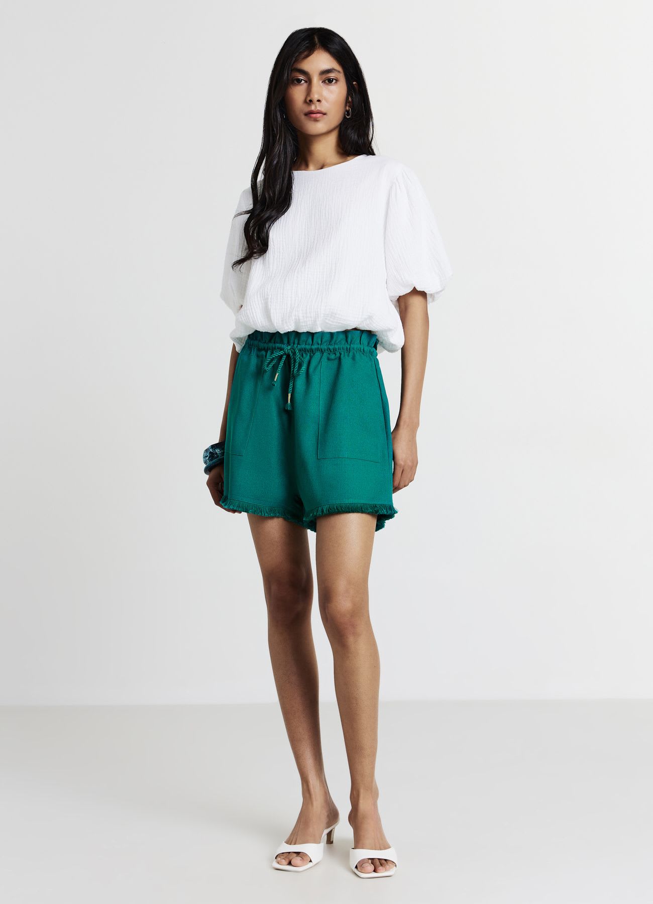 Pantaloncini misto lino frange