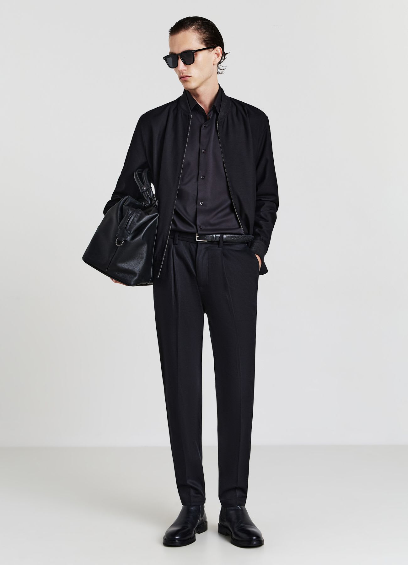 Pantaloni chinos con pinces