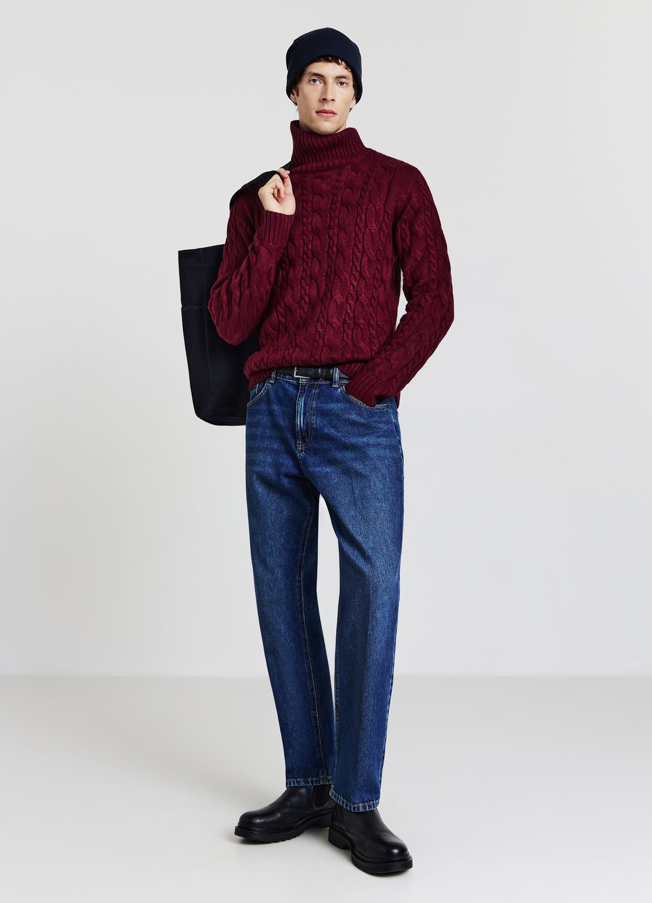 Maglione dolcevita con trecce