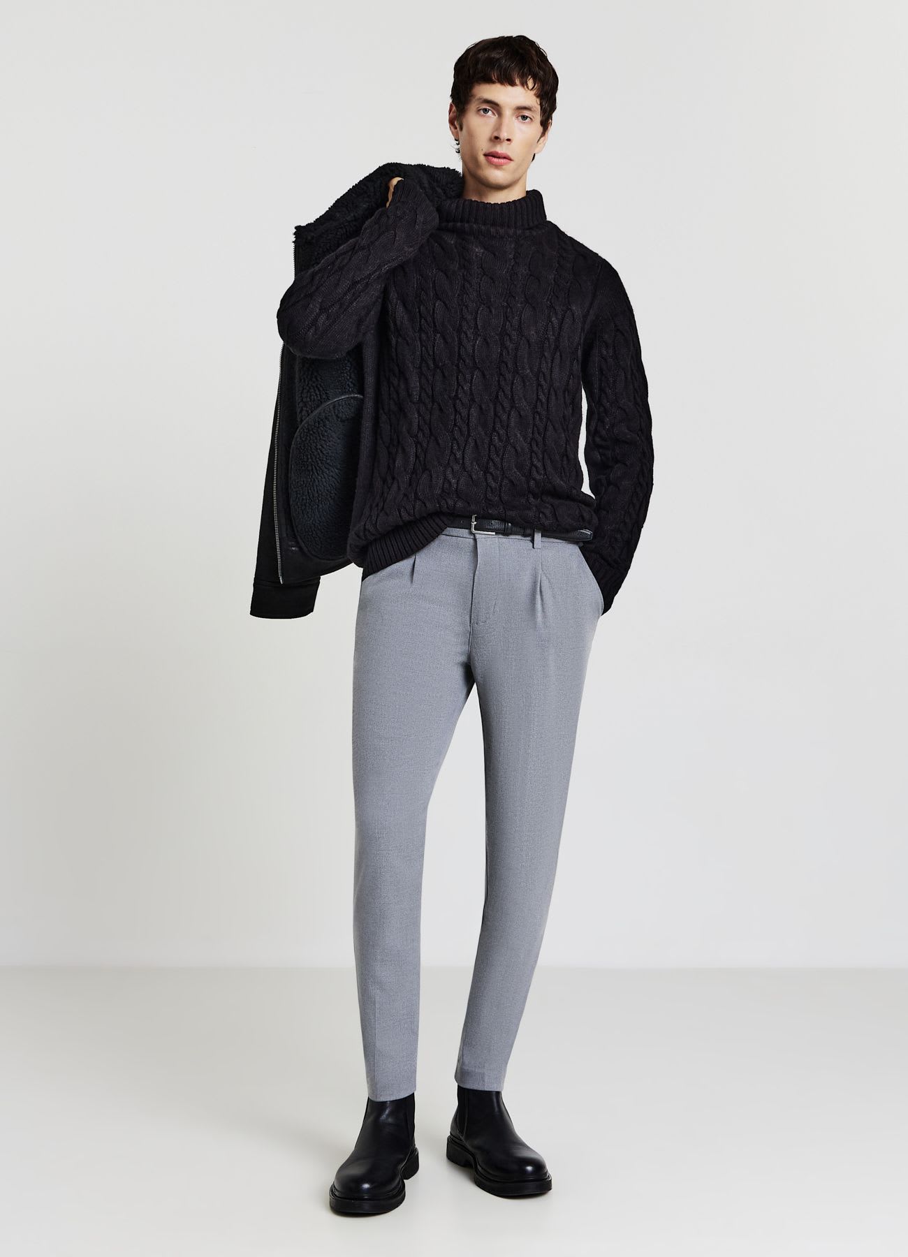 Maglione dolcevita con trecce