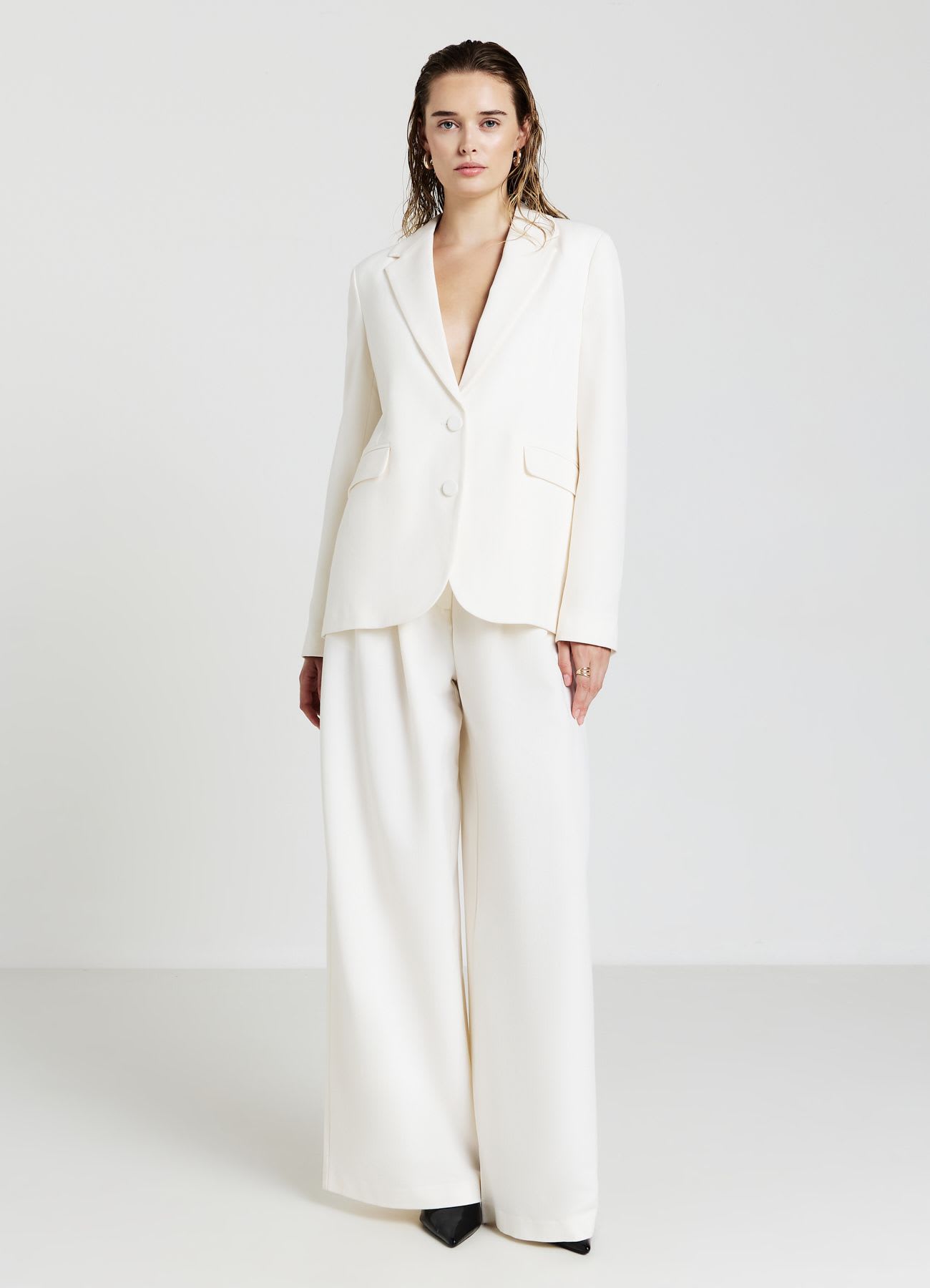 Pantaloni palazzo con pinces