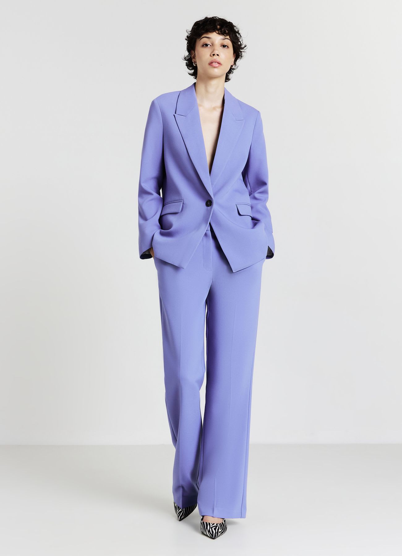 Pantaloni flare a vita alta