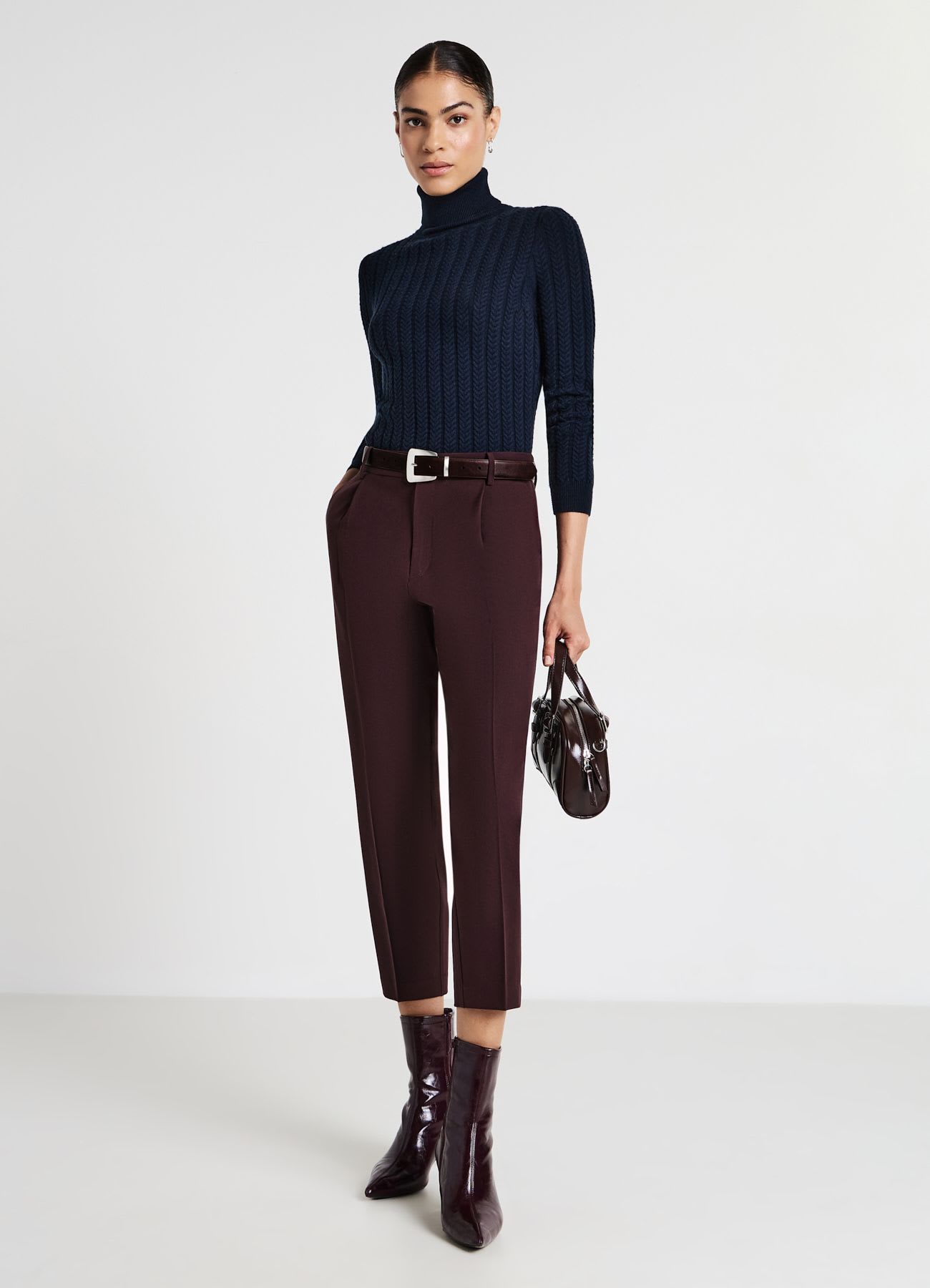 Maglia dolcevita con trecce