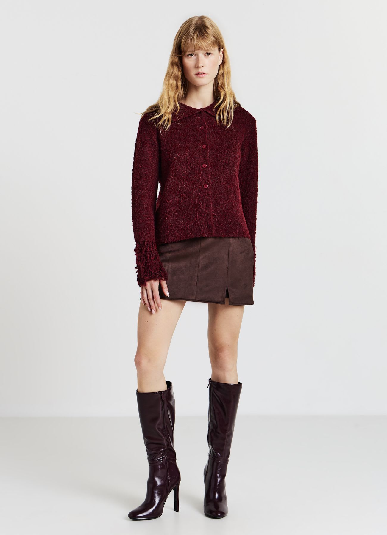 Cardigan bouclè con bottoni