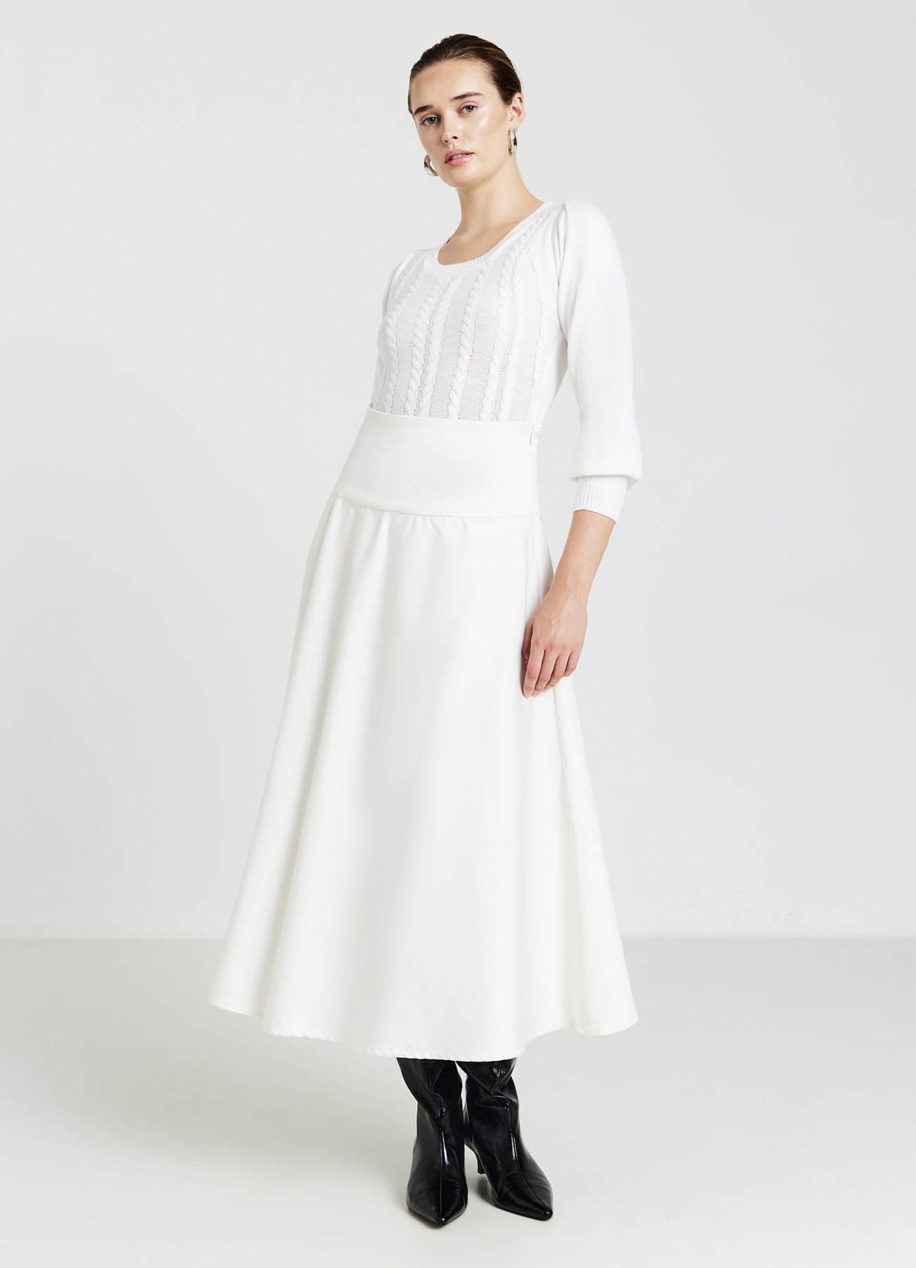 Body in maglia con trecce
