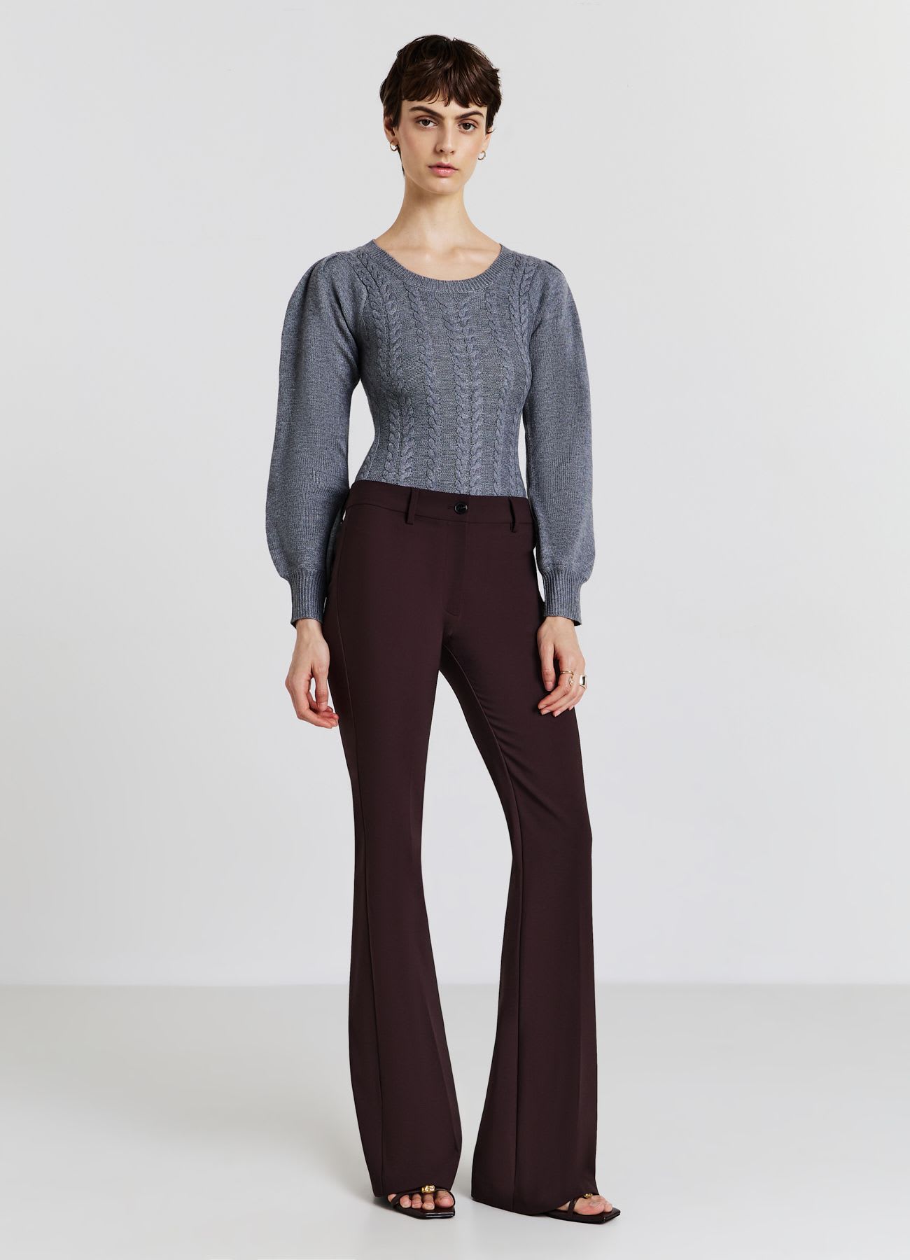 Body in maglia con trecce