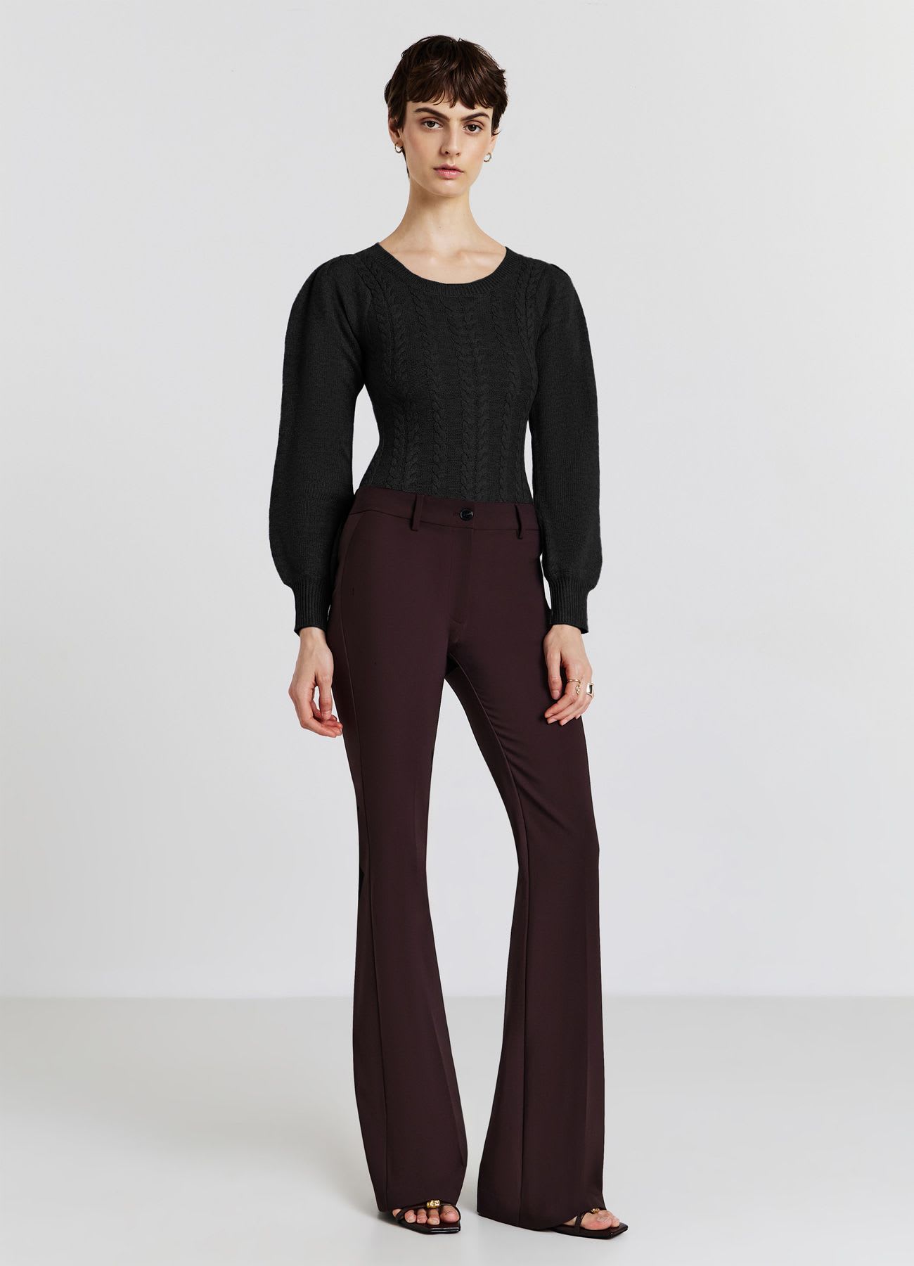 Body in maglia con trecce